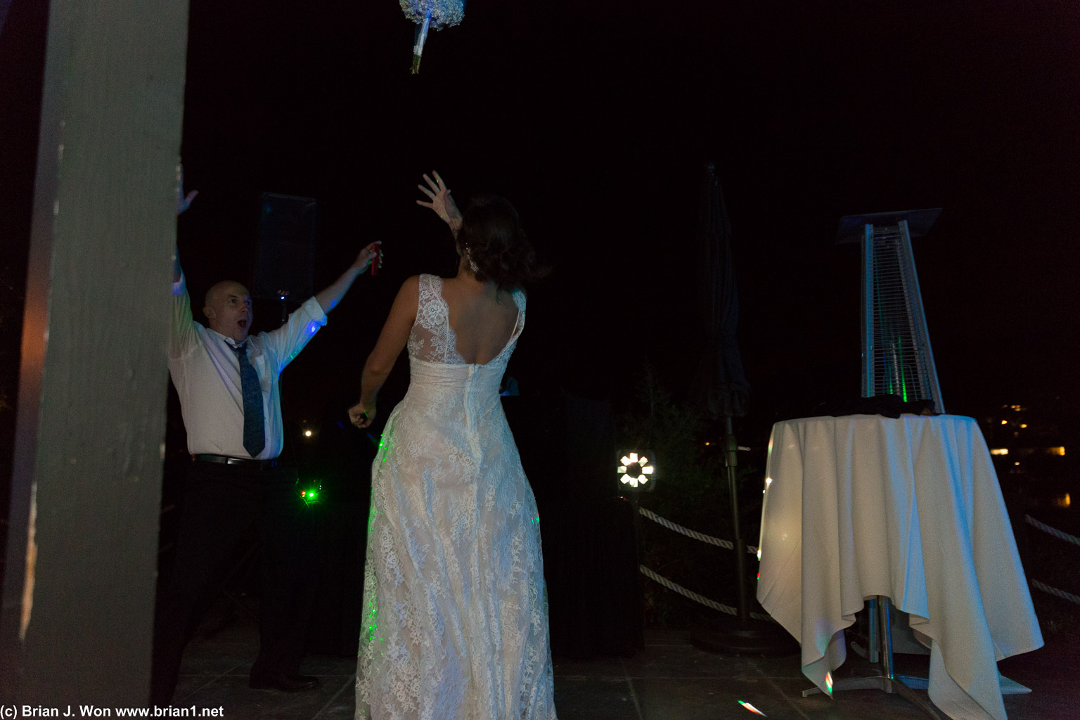 Bouquet toss! (why does Dan look so triumphant?)