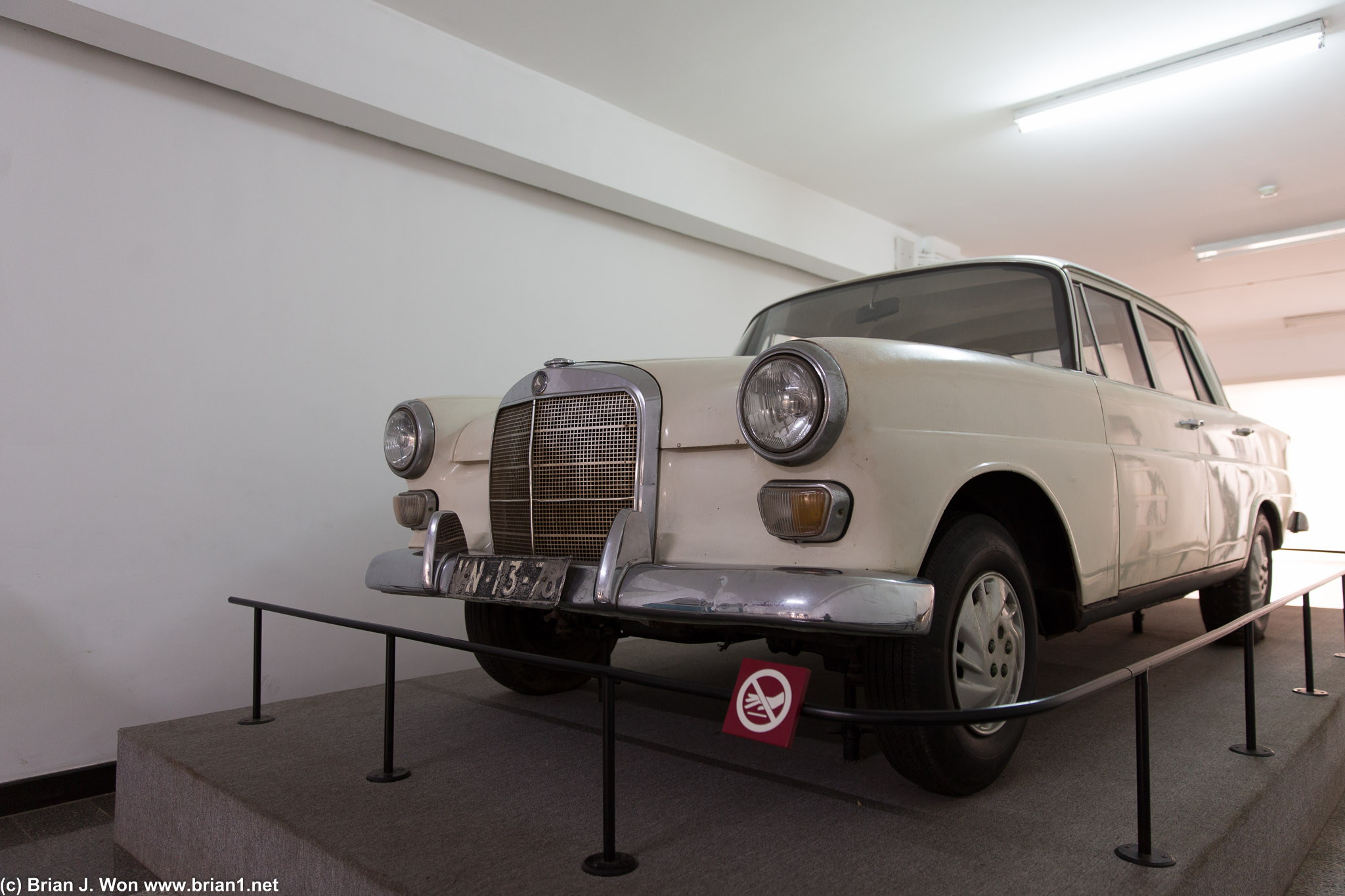 Mercedes 200. Although... those look like awfully modern hubcaps.