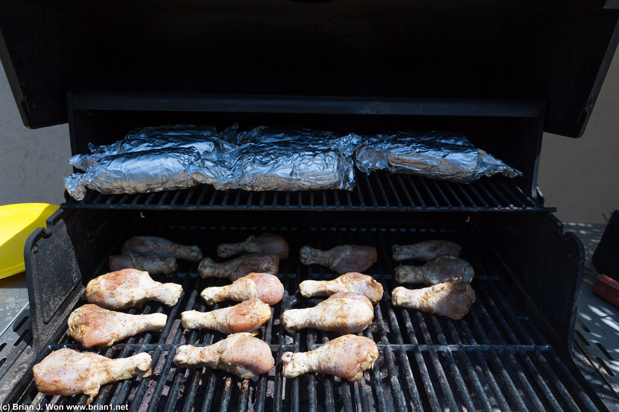 Grilling chicken and corn.