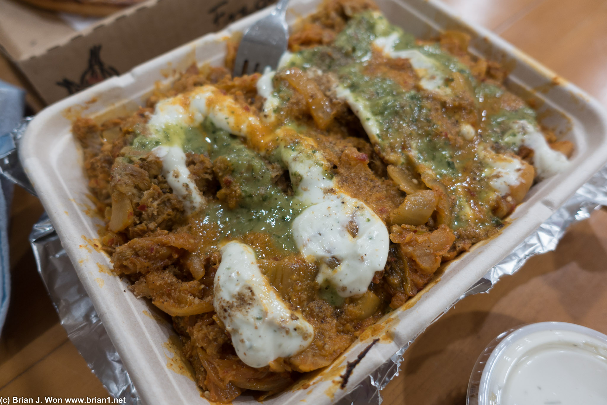 Carnitas kimchi fries. Too much topping, not enough french fry. And it was HUGE.