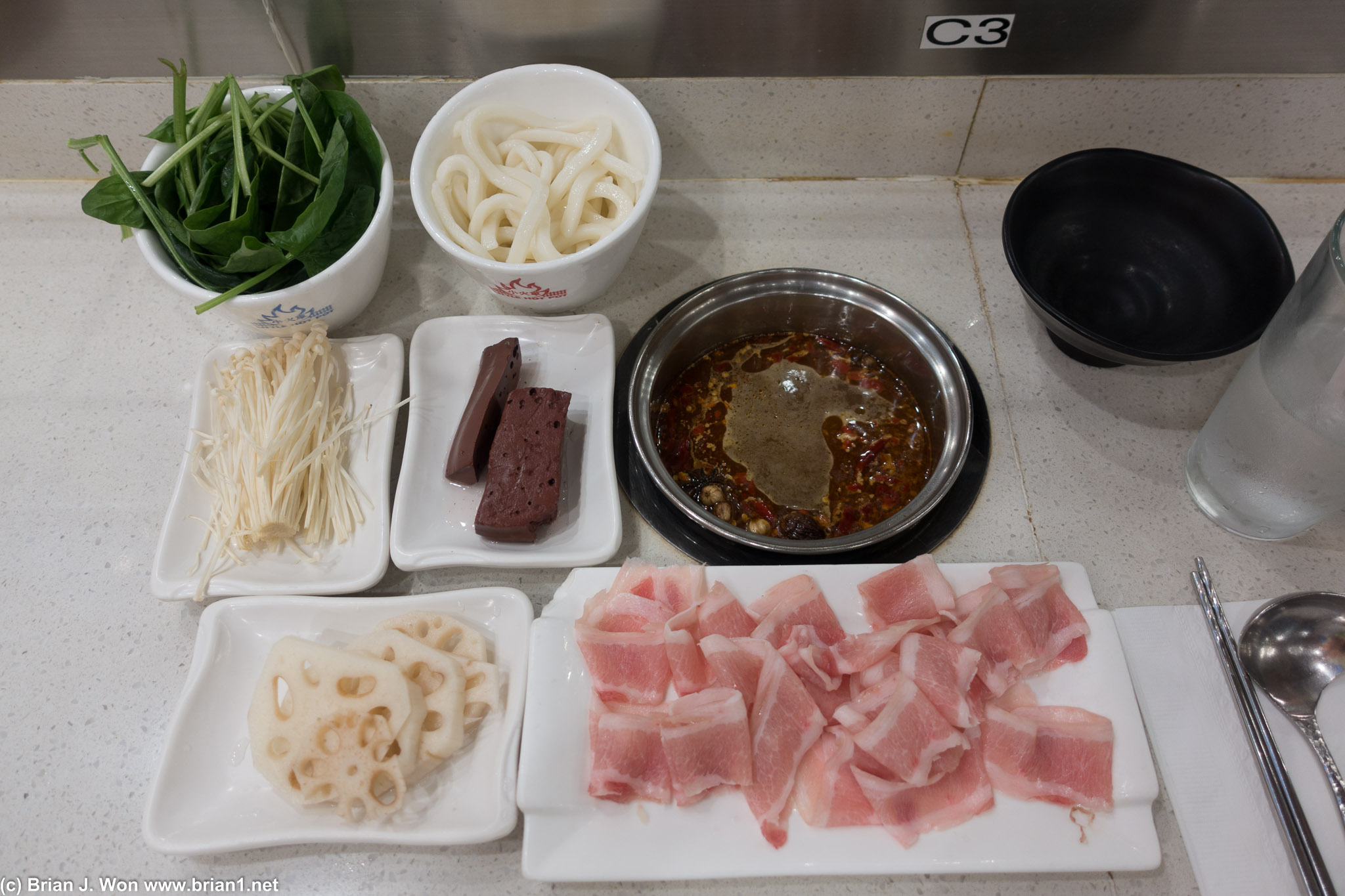 Taiwanese spicy hot pot, pork belly, pork blood, lotus root, etc.