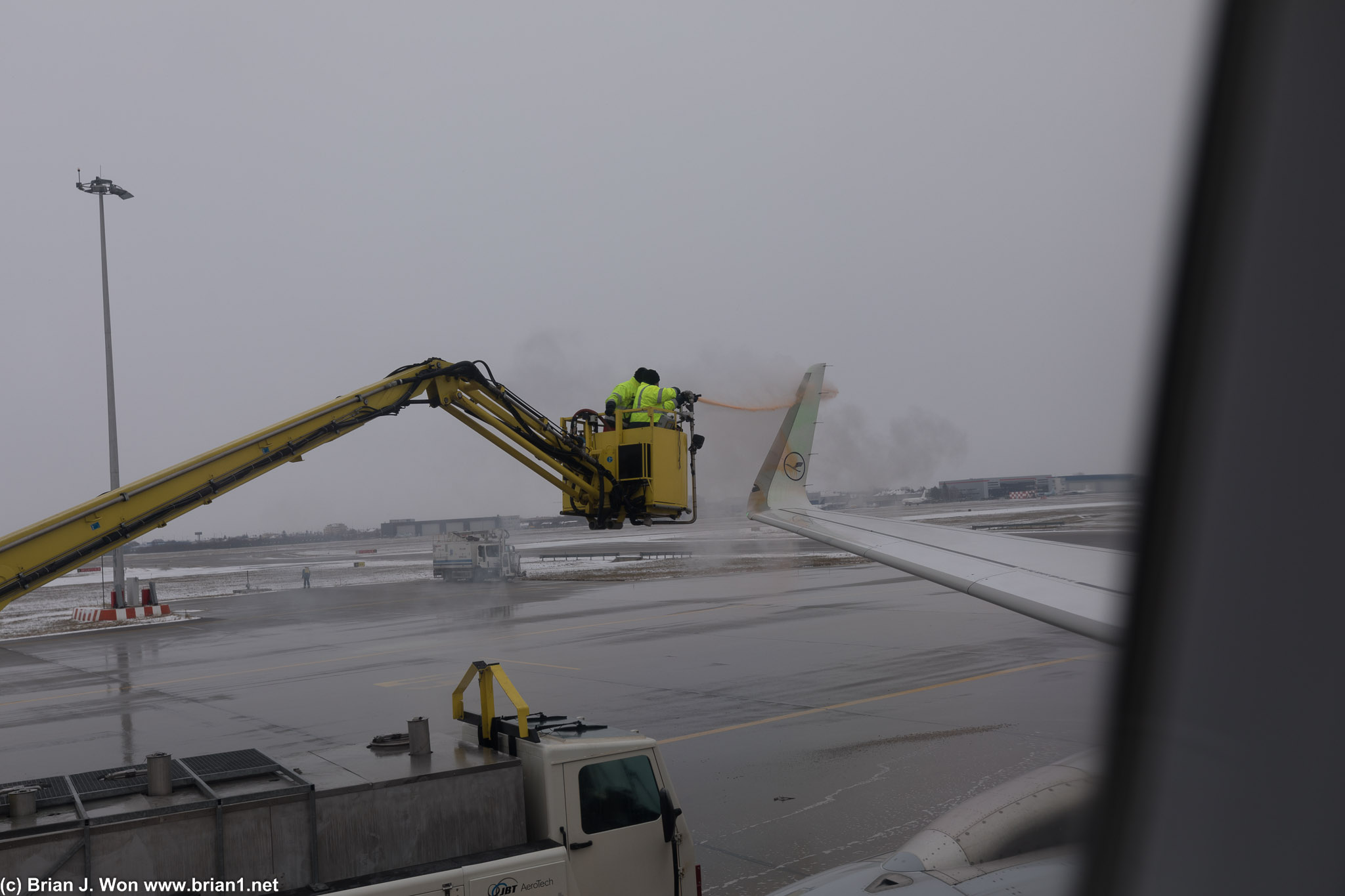 De-icing the plane before takeoff.