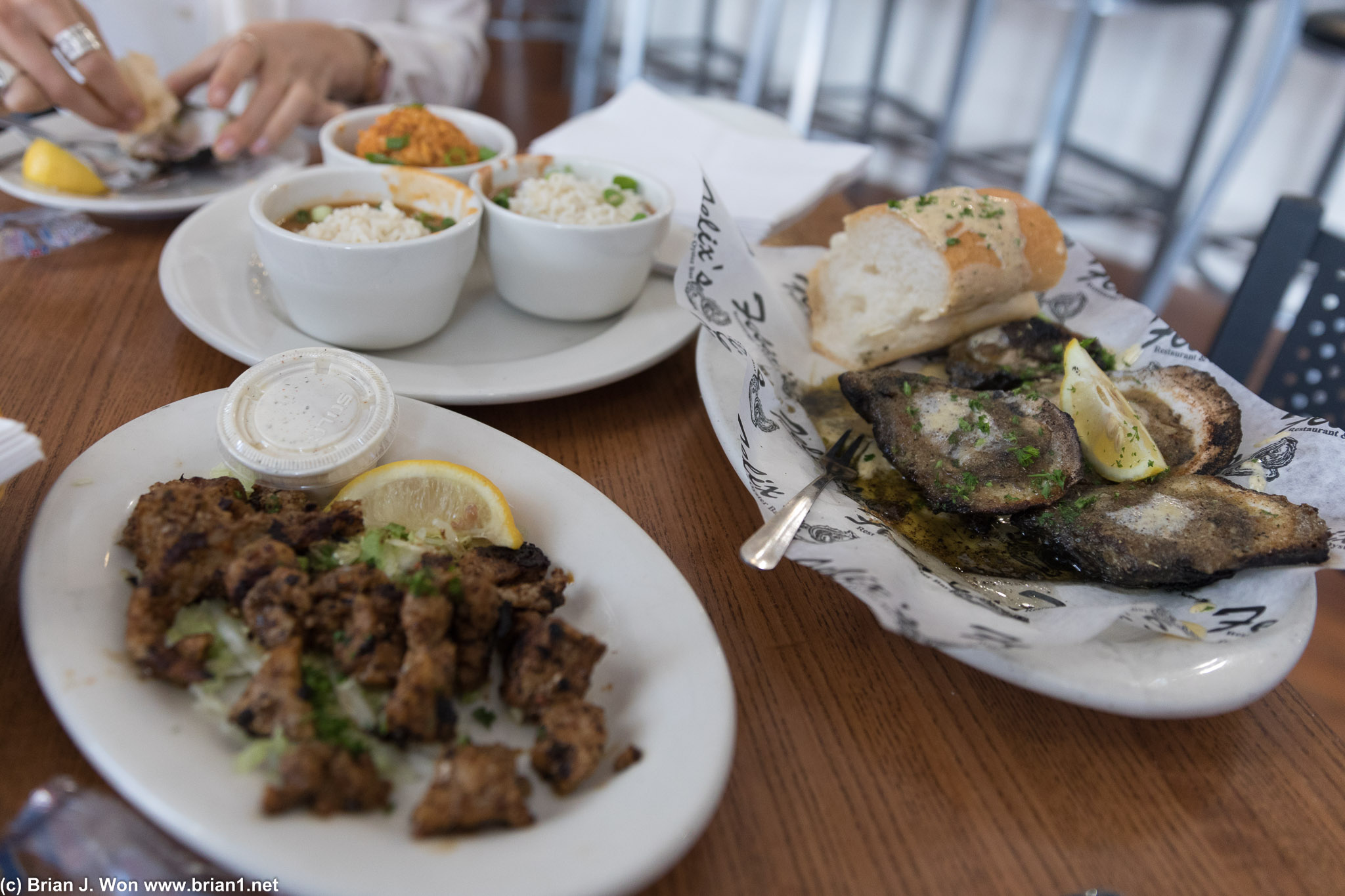 Char grilled oysters and alligator bites.