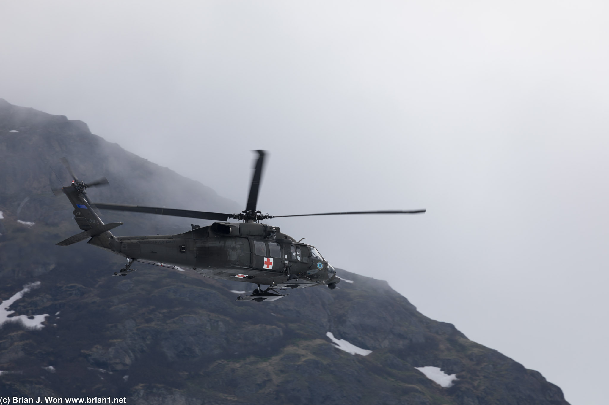 UH-60L Blackhawk flying overhead.