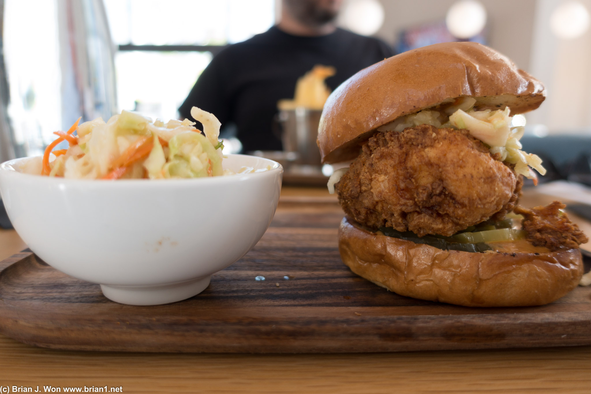 Angry buttermilk chicken sandwich and cole slaw.