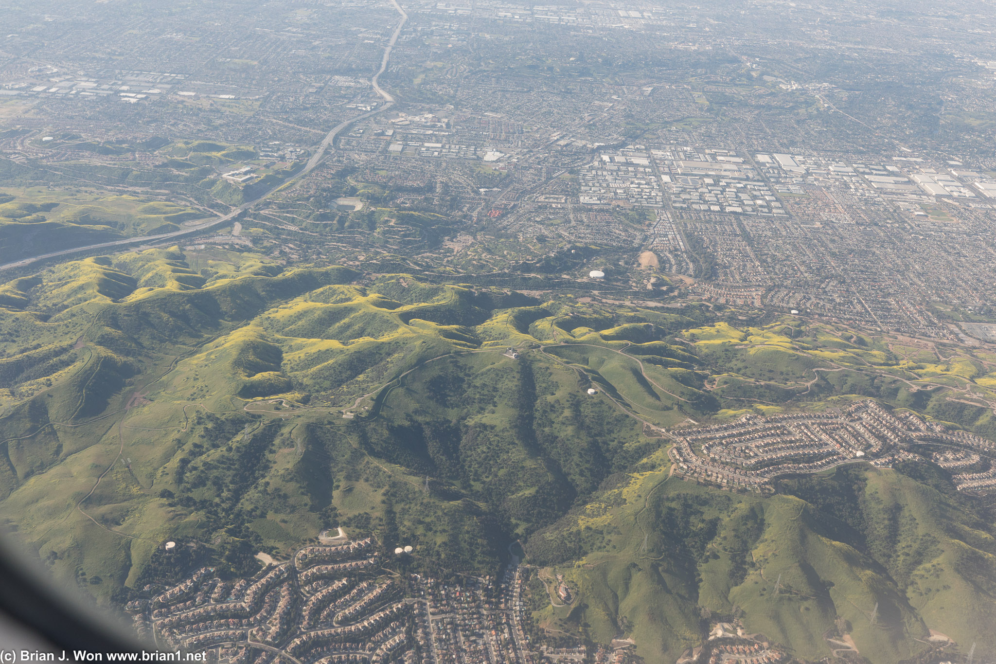 CA-57 on the left, Rowland Heights at the very bottom, Brea in the background. Wildflowers in the hills.