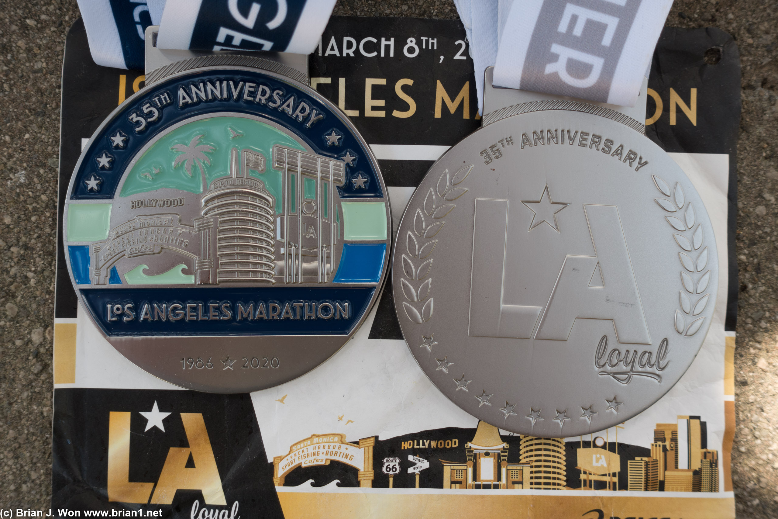 Both LA Marathon medals together-- finisher and LA Loyal.