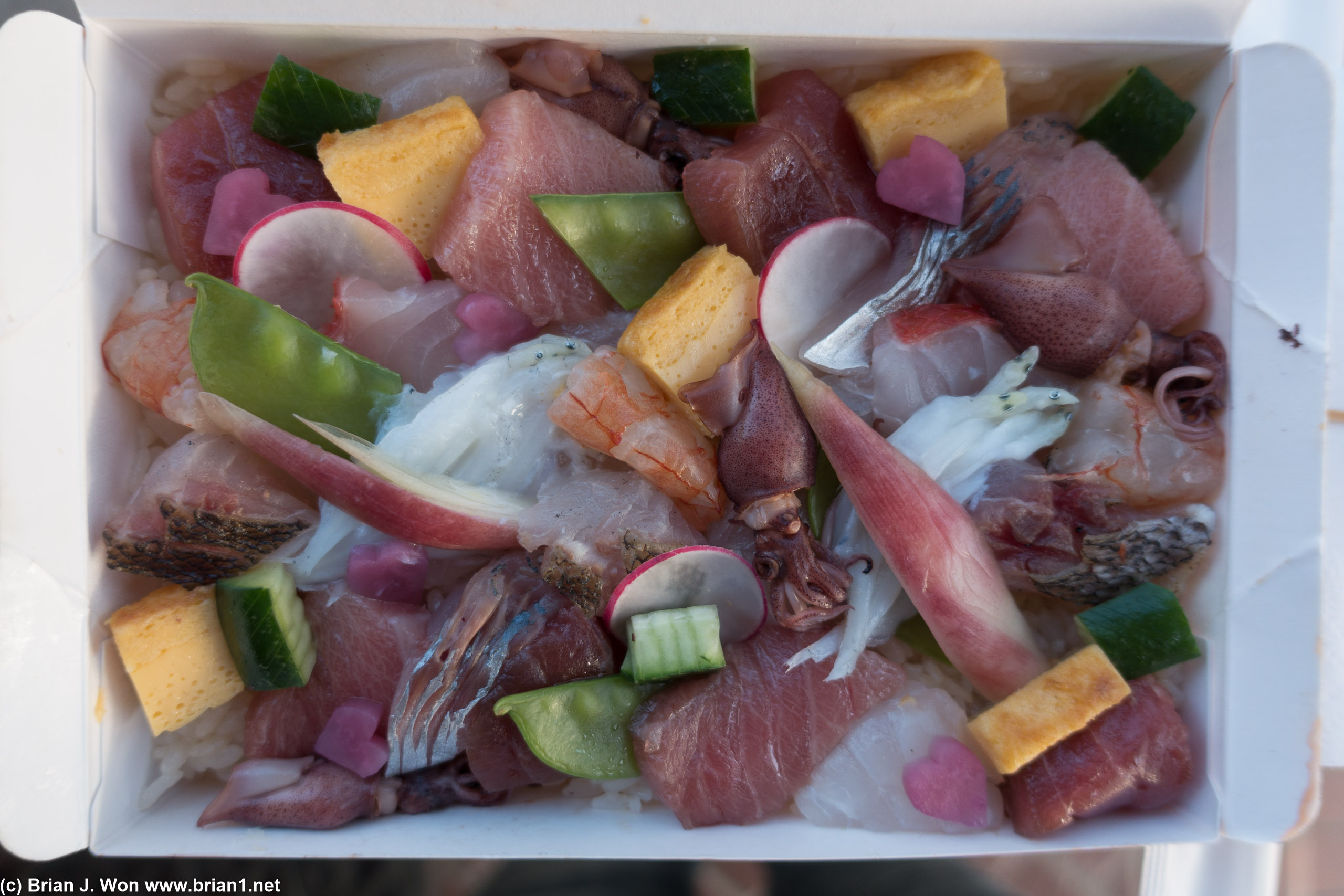 Ice fish (shirauo), sparking squid (hotaru ika- firefly squid), halibut (hirame), black seabream (kuro dai), bluefin tuna (hon maguro), bluefin medium toro (chutoro), golden eye snapper (kinmedai), grunts (isaki), shrimp (ama ebi kobujime), red snapper (mai da), spanish mackerel (aji), tamago, daikon.