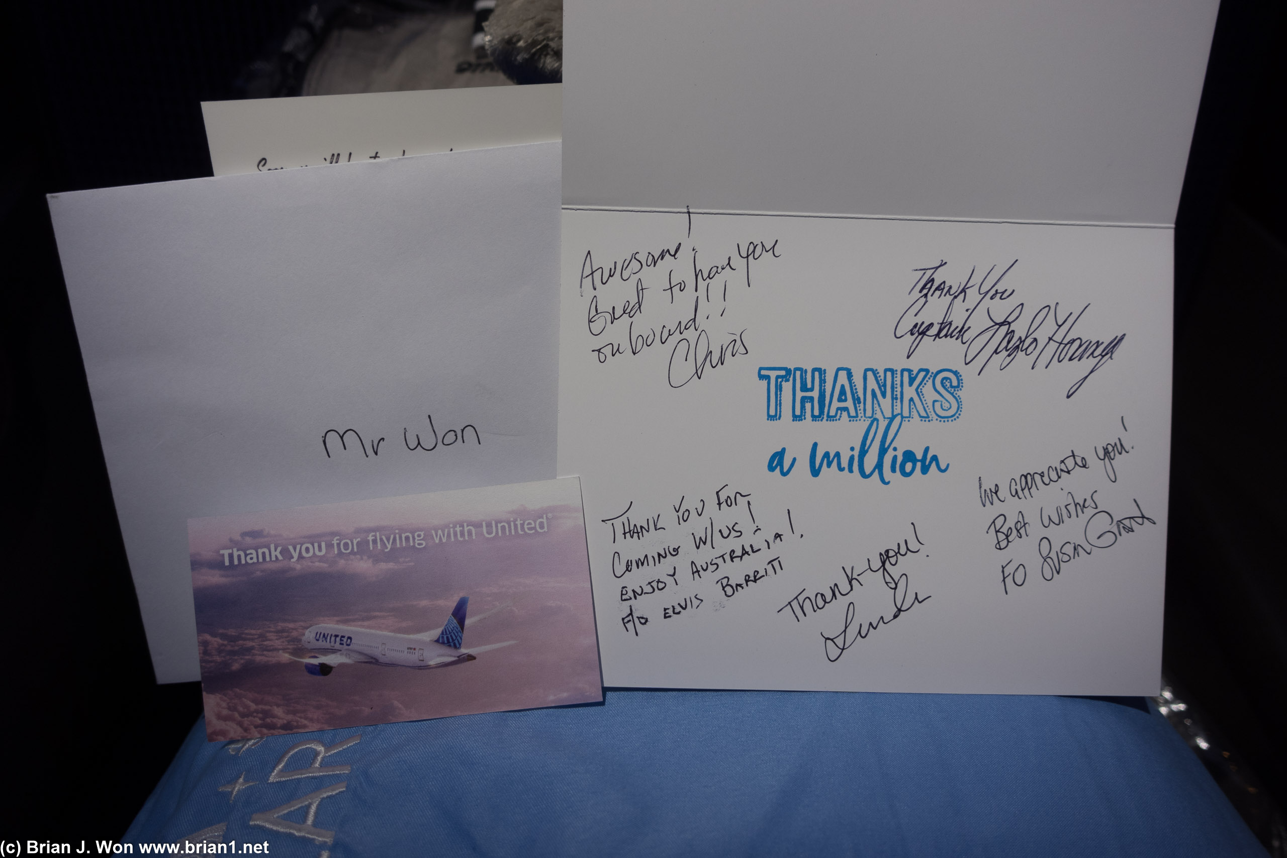 Swag for my 1,000,000th mile on United including a card signed by all the pilots.