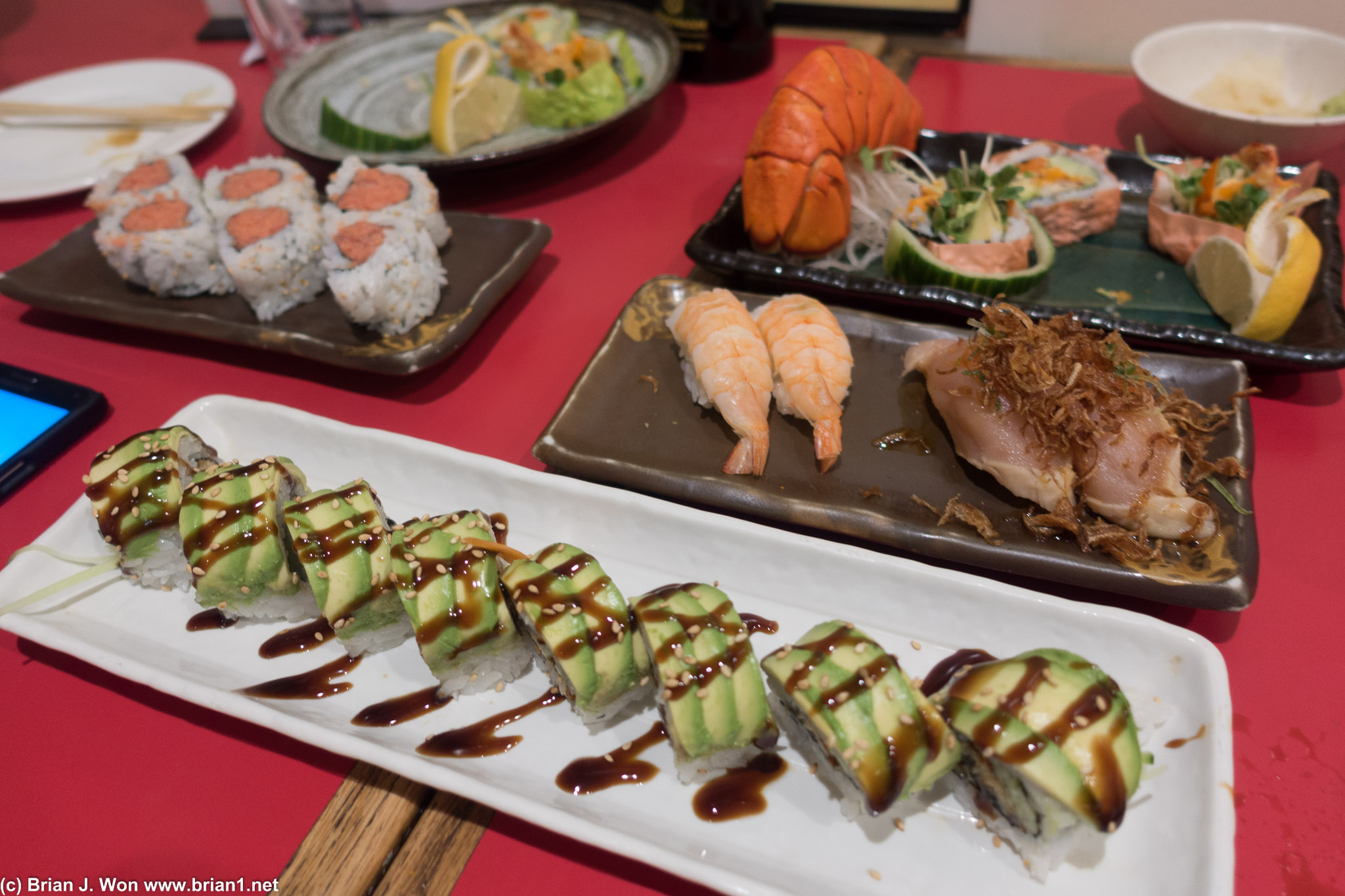 Caterpillar roll in front, rest of the spread in the back.