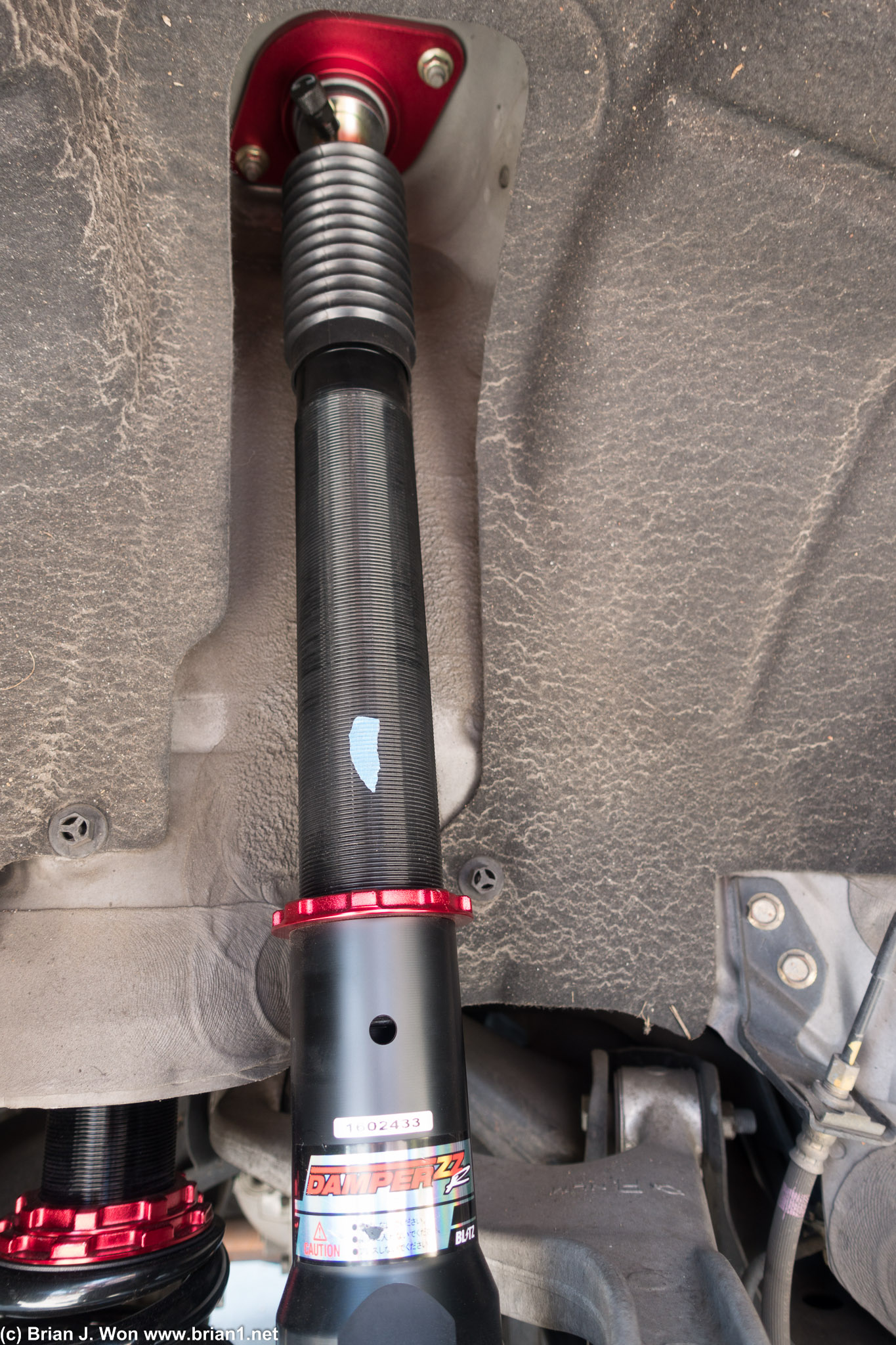 We adjusted the shock height too to match, of course. Note painter's tape we placed to know how much we turned it.