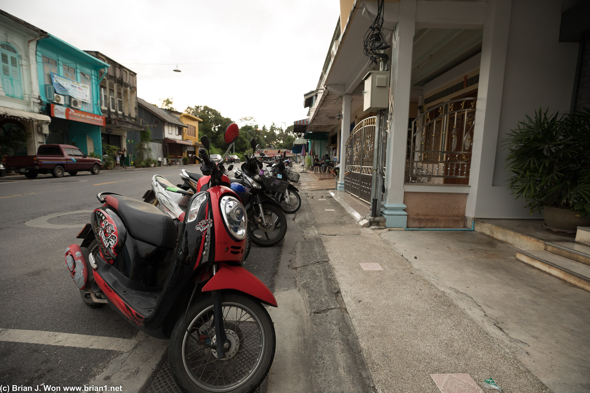 Scooters lined up in Old Town Phuket.