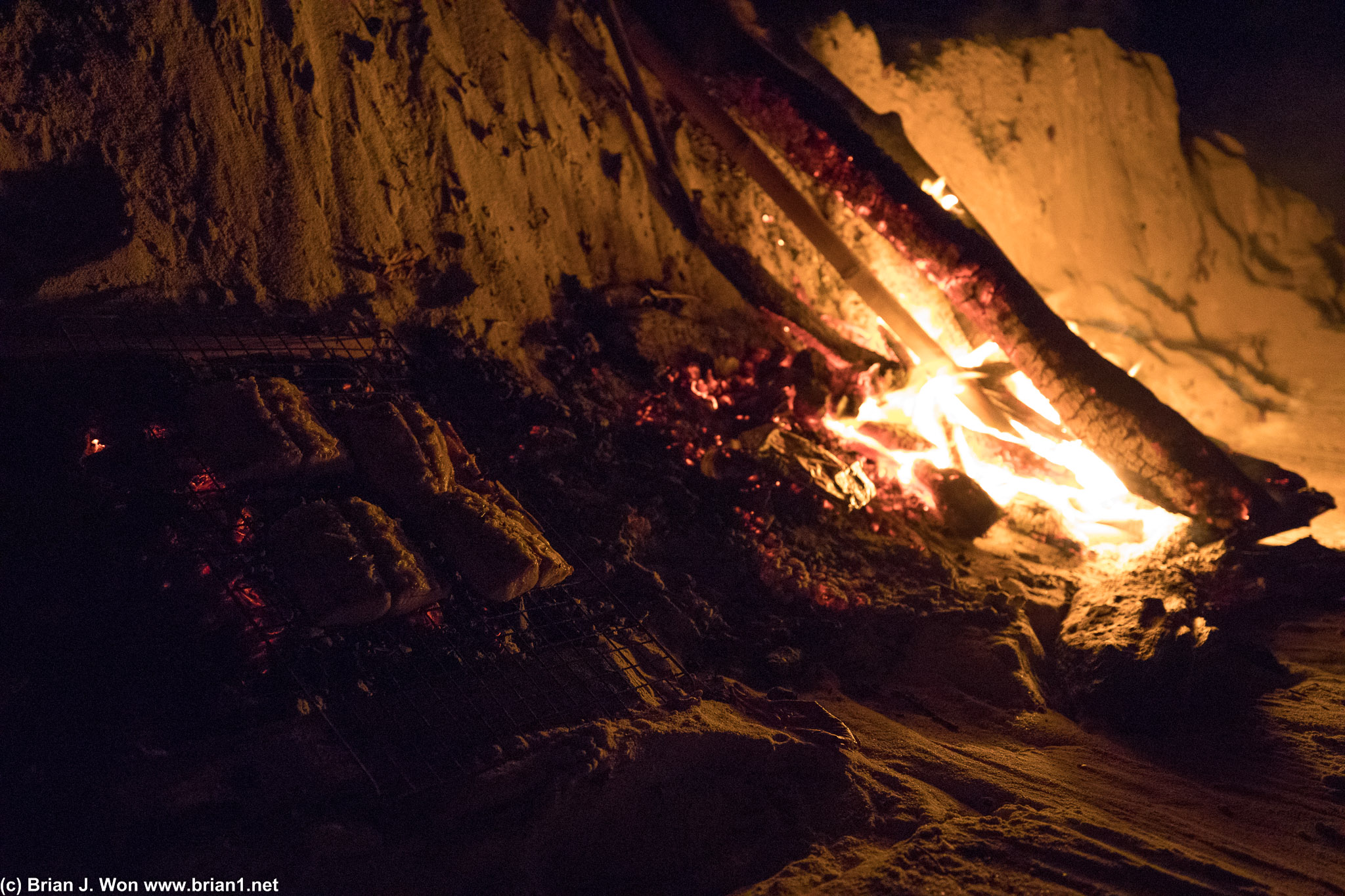Fish over the coals.