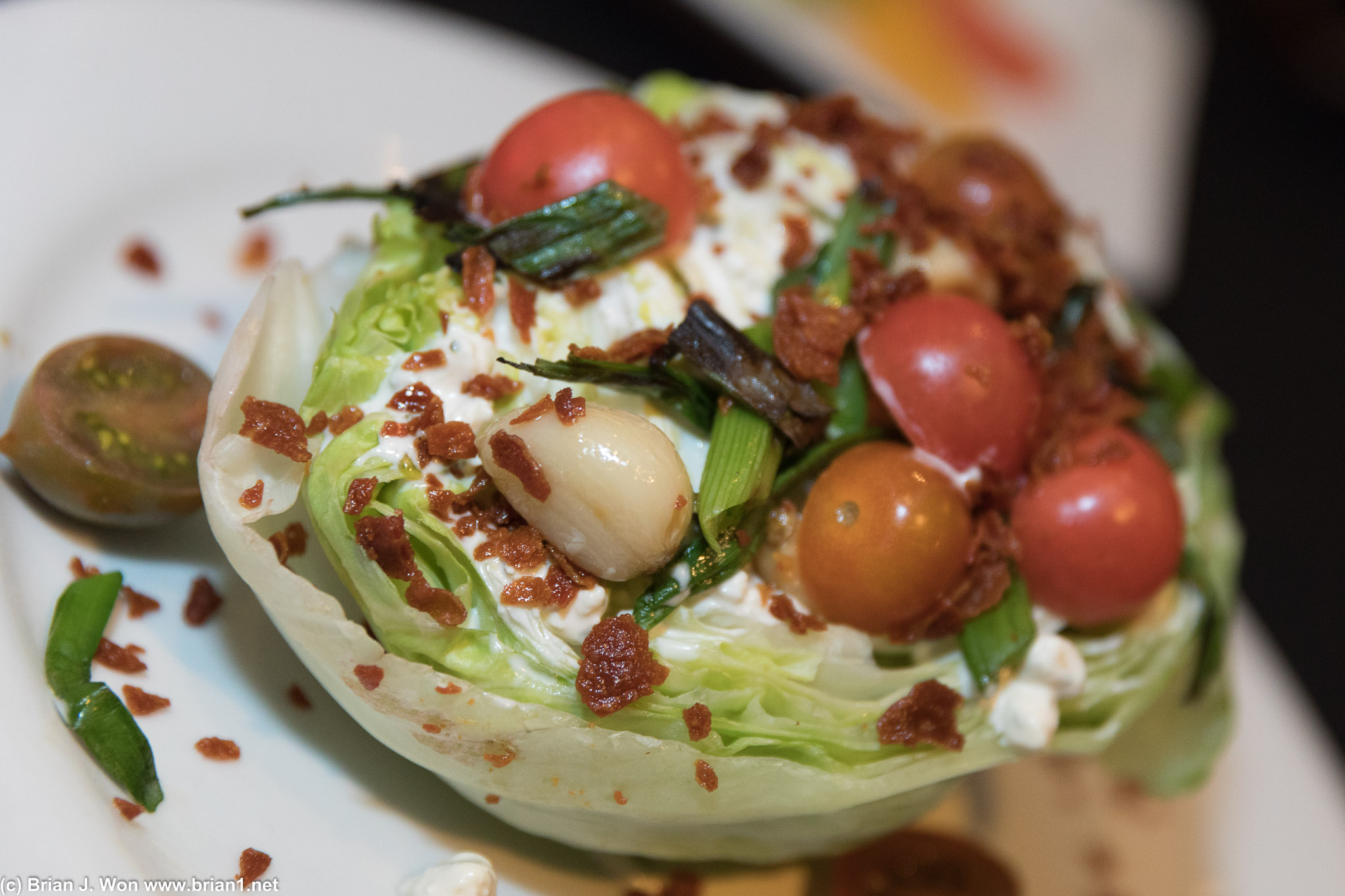 "Wedge" salad was literally half an iceberg lettuce.