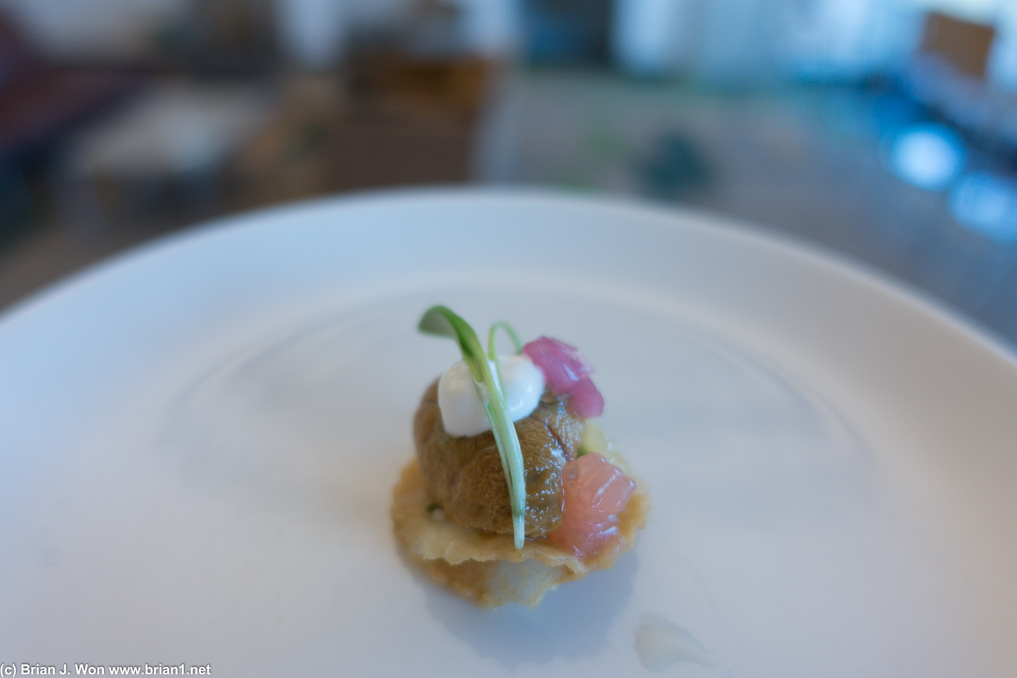 Uni. I forger which chef. TIny, tiny portion, yet the cracker still almost overwhelmed the uni.