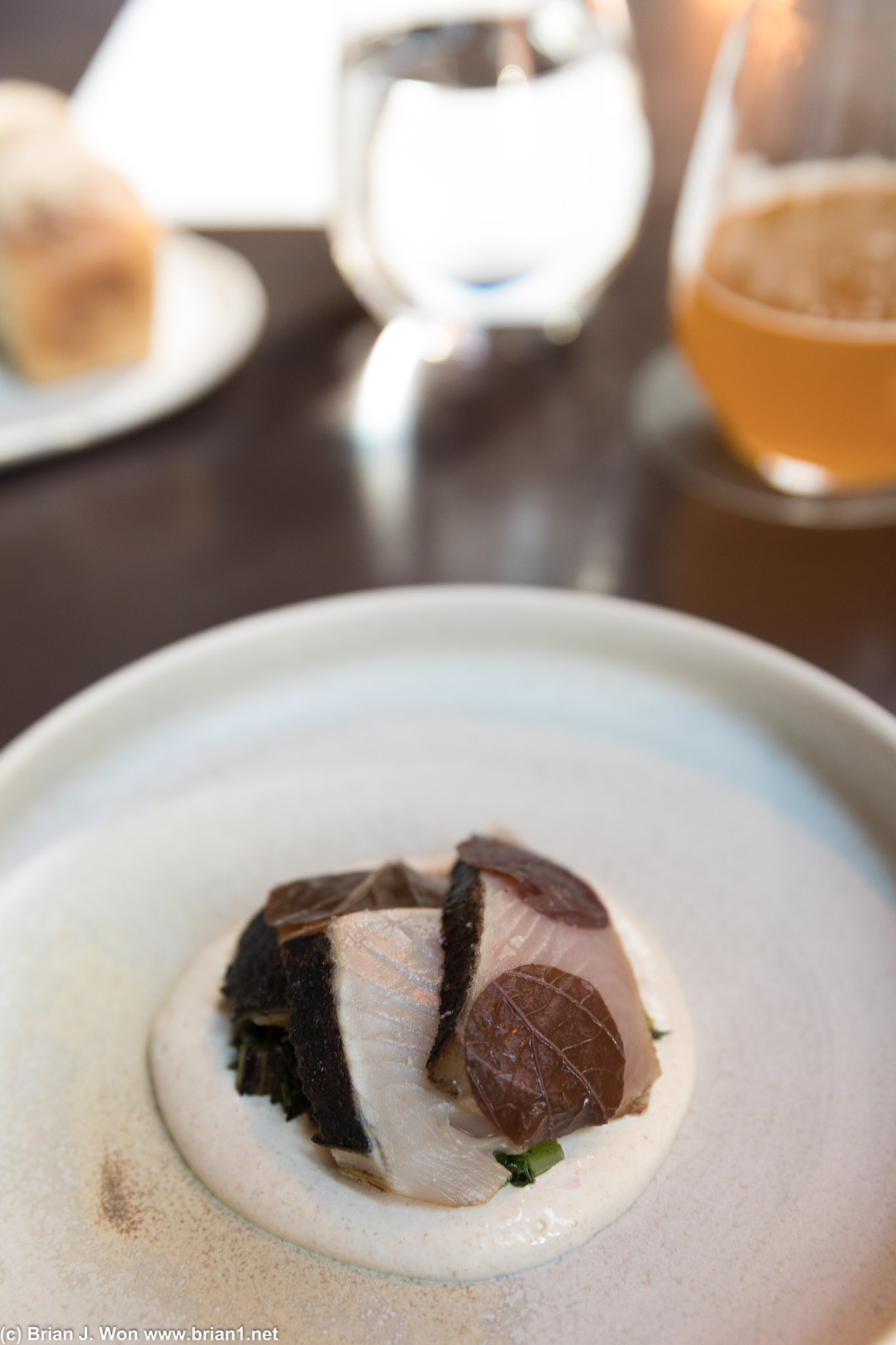 Seared bonito. Pickled shiso atop, grilled gai lan underneath. So good.