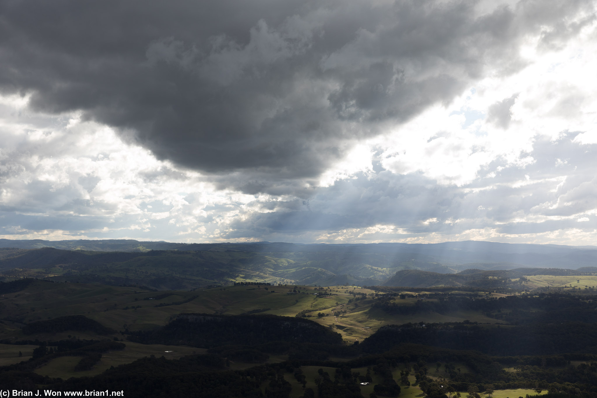 Sun rays shine down on the valley below Mt. Blackheath.