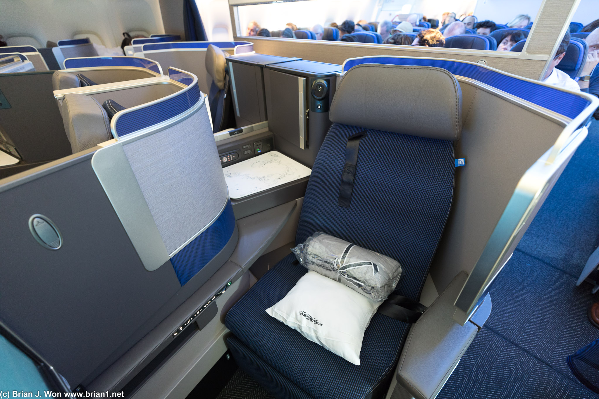 Even-numbered aisle seat. Definitely less privacy.