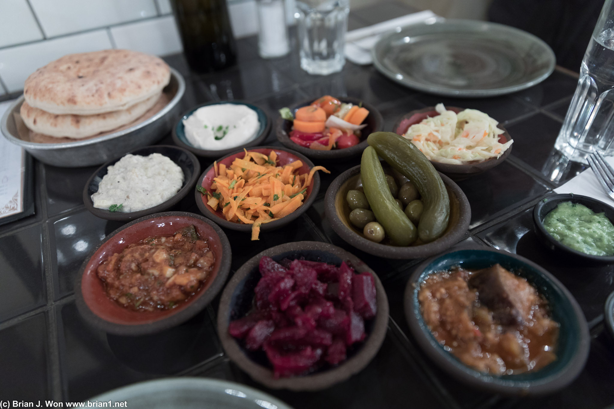 Pickled vegetables, hummus, and pita.