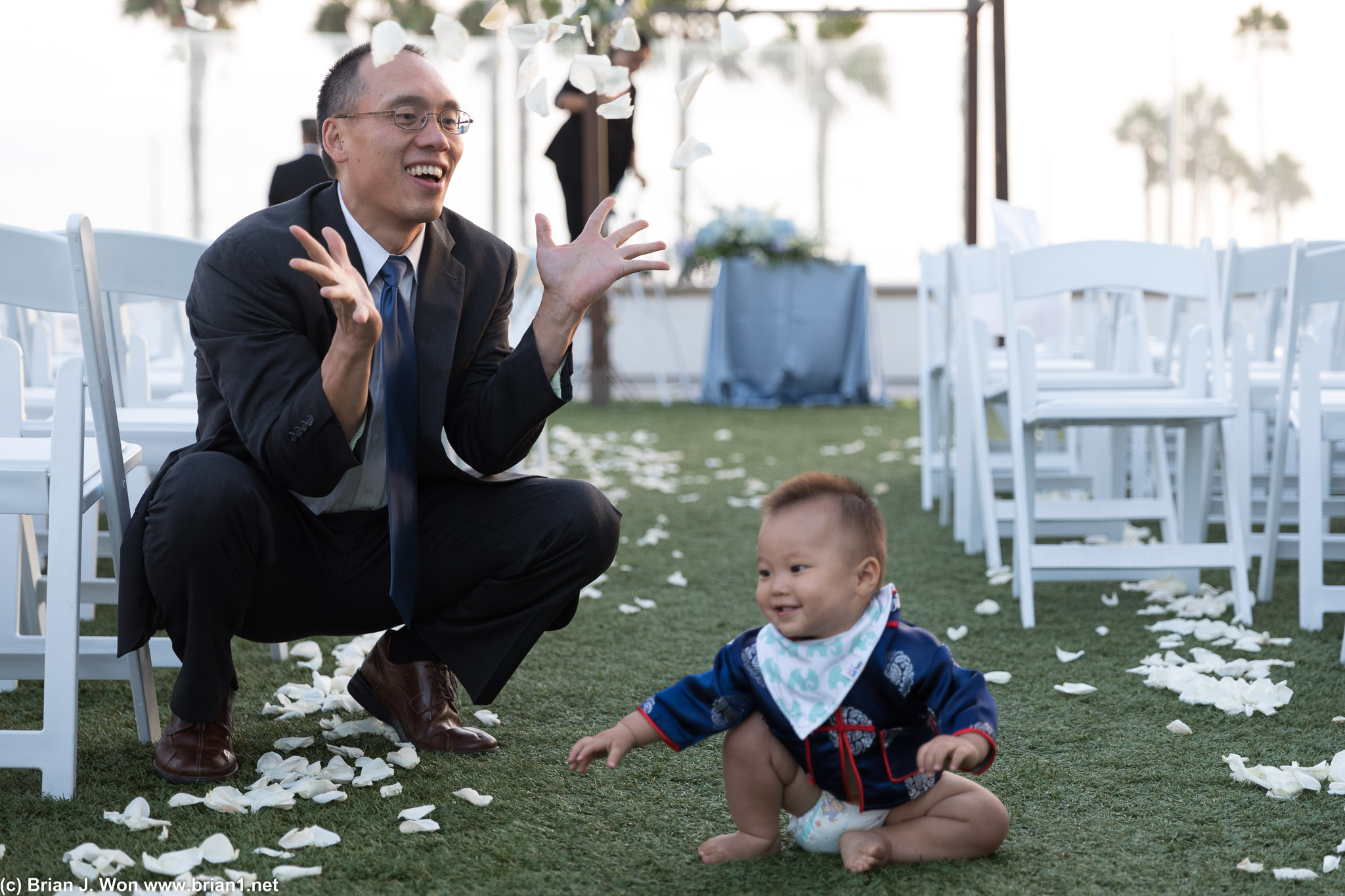 Throwing rose petals.