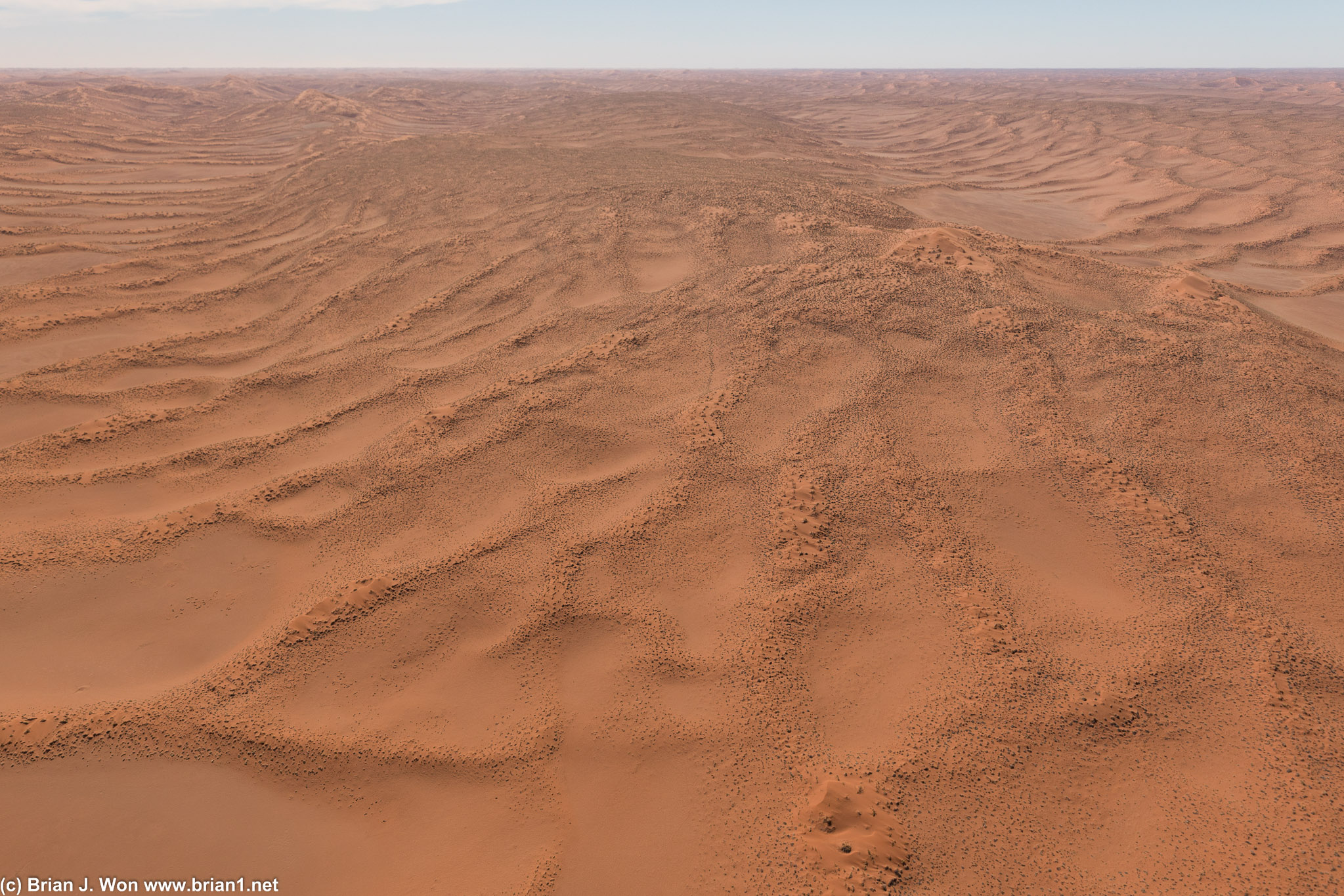 You can see the pattern of the dunes changing in the distance.
