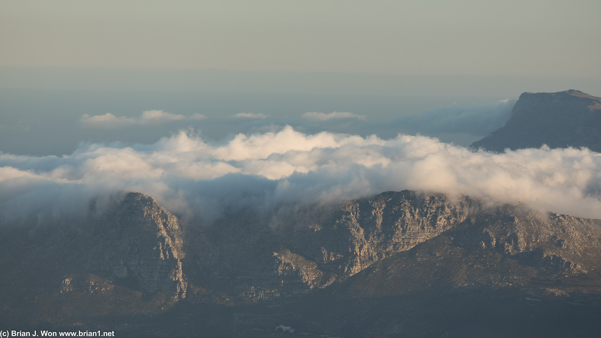 Clouds covering the mountains to the west.