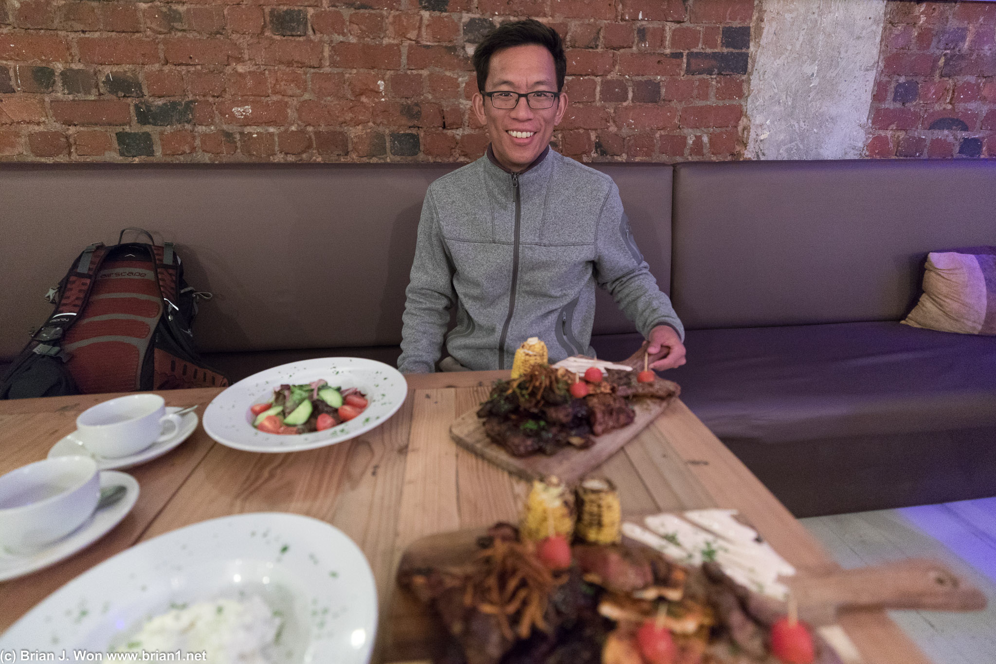 Sam doesn't look intimidated at the least at the amount of food on his plate. He might be crazy. Or fearless?