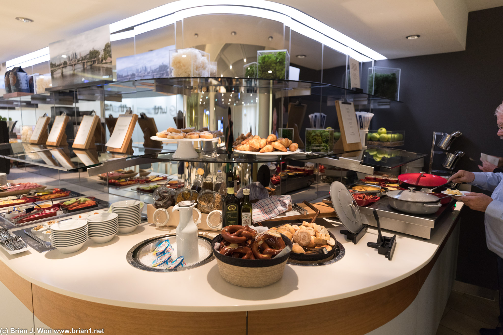Cold food at left, breads at center, hot food at right.