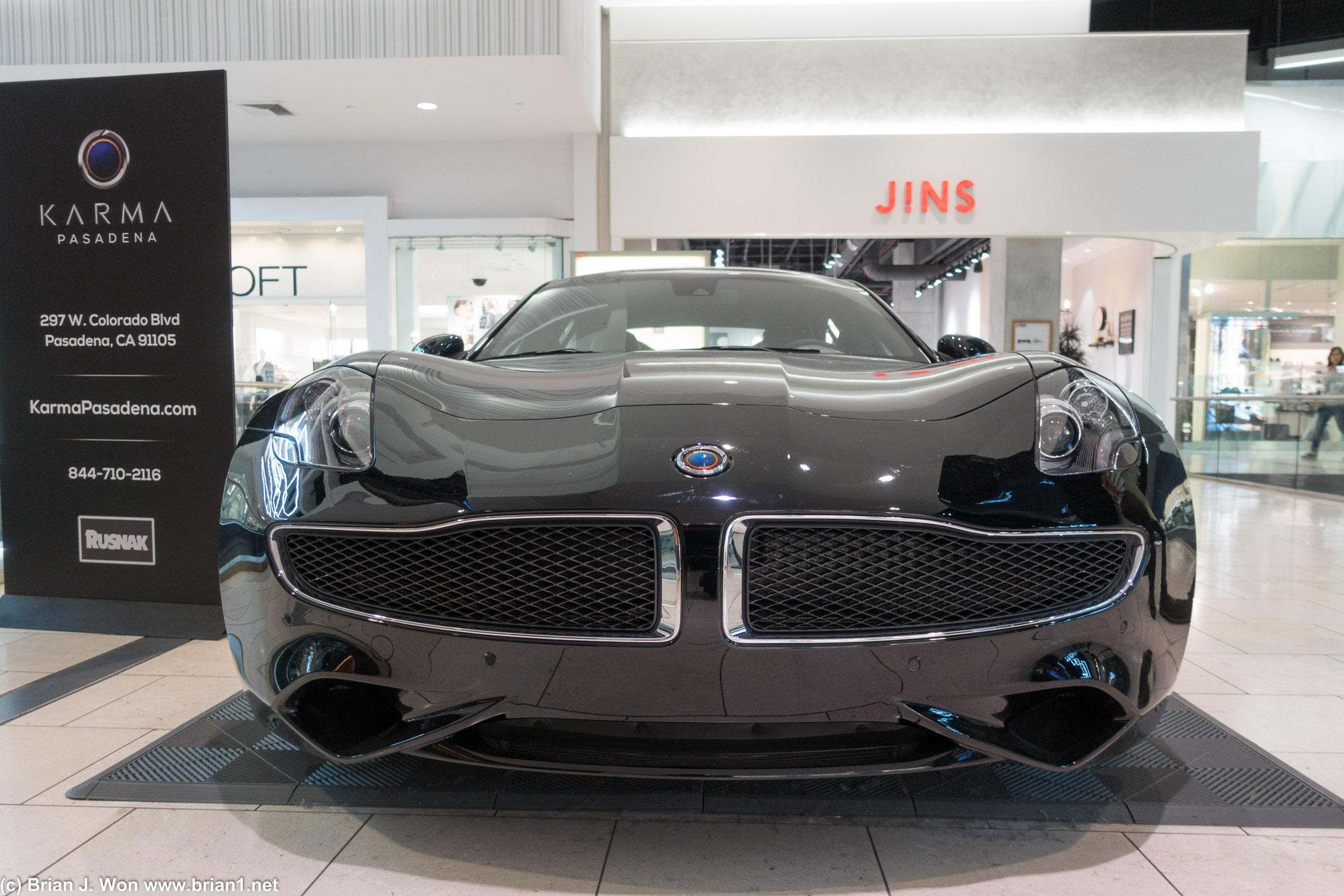 A porky 5,400lb and something like 52mpg-e (EV), 20mpg (gas).