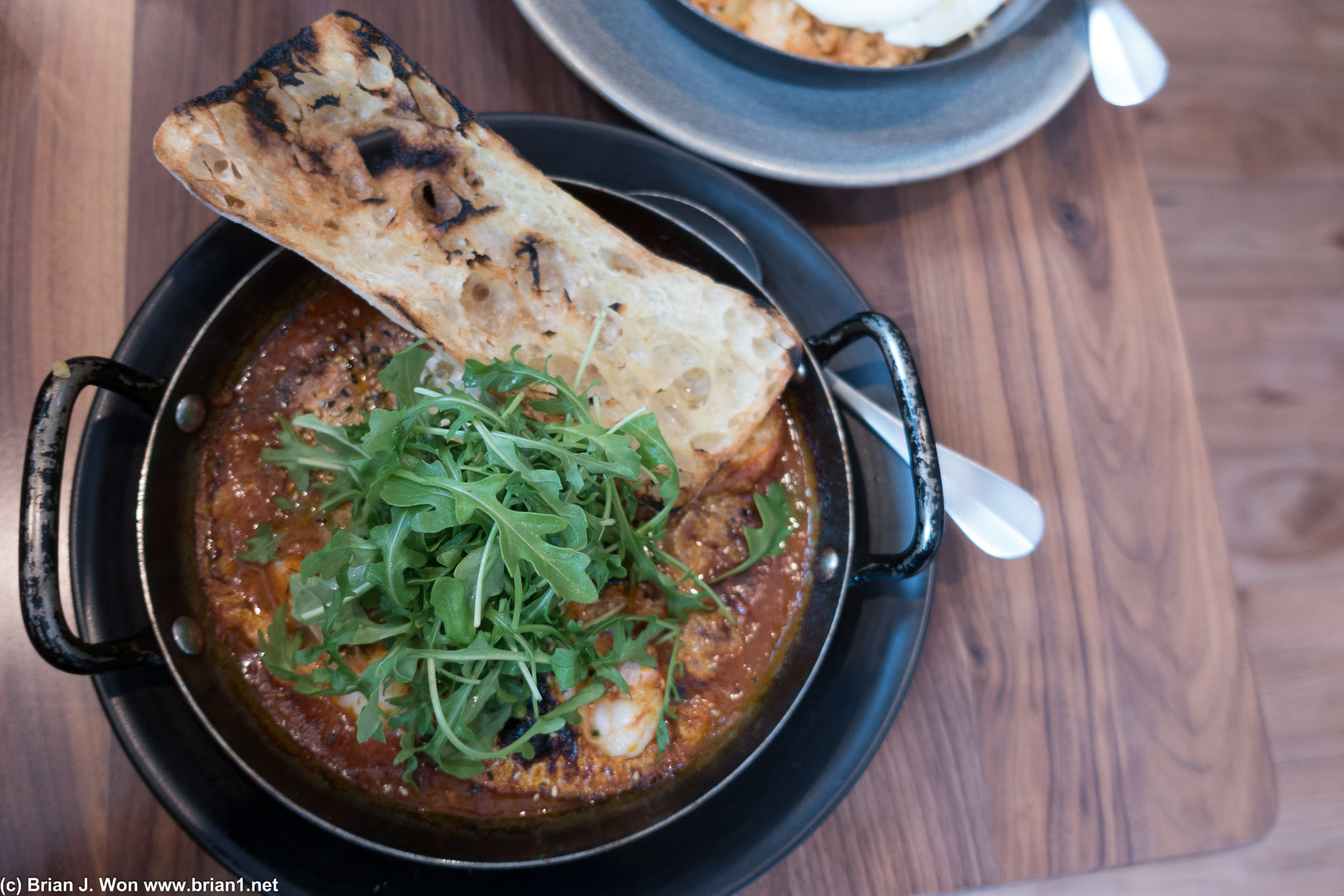 Shakshuka. Kind of like a shrimp-tomato stew.