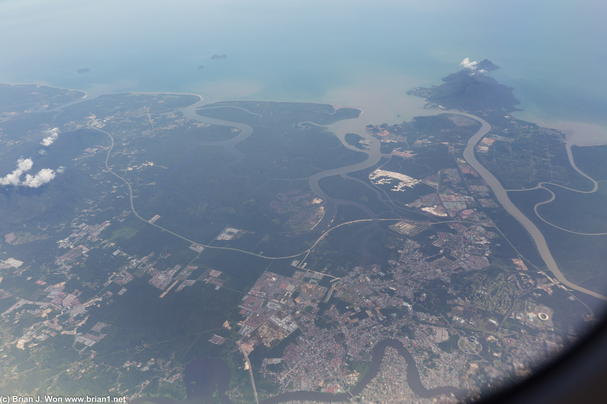 Kampung Budaya Sarawak and Samtubong National Park in the distance, the city of Petra Jaya in the foreground.