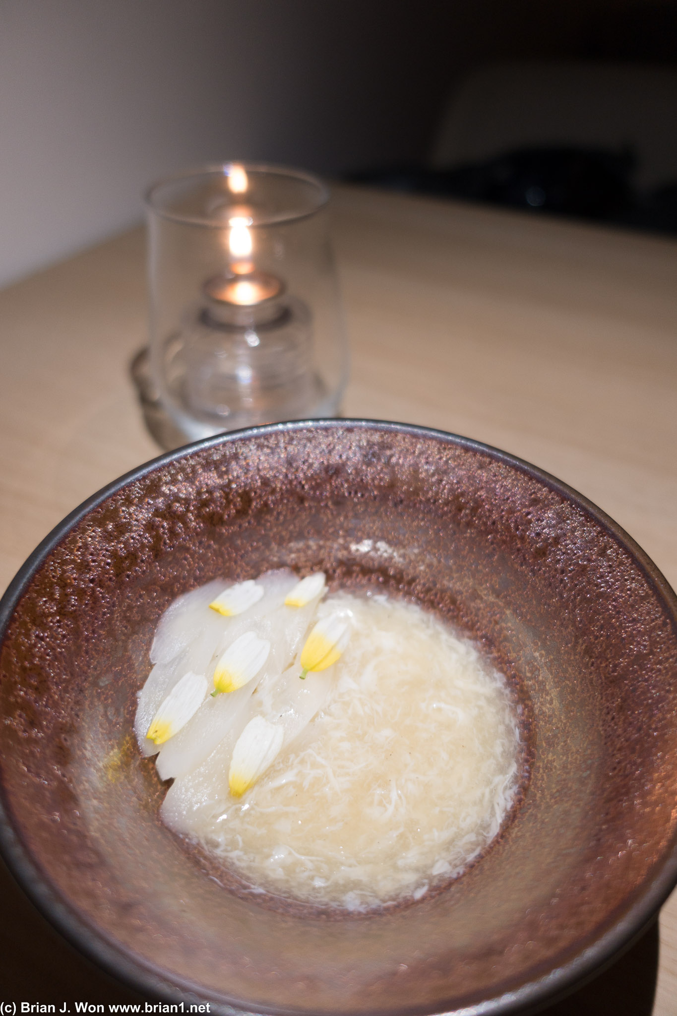 Silken tofu with steamed crab and asparagus over the top. Very delicate.