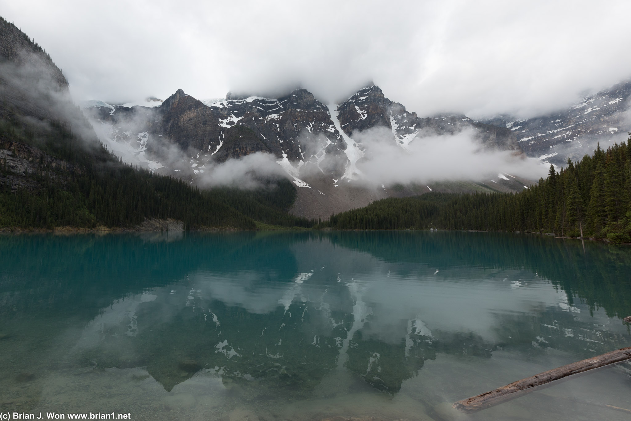 The sun cooperated, reflecting the mountains and clouds off the lake.