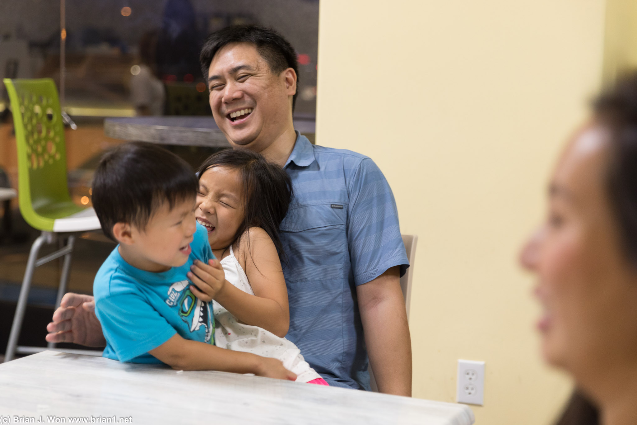 The Yang kids have clearly taken to Uncle Chris.