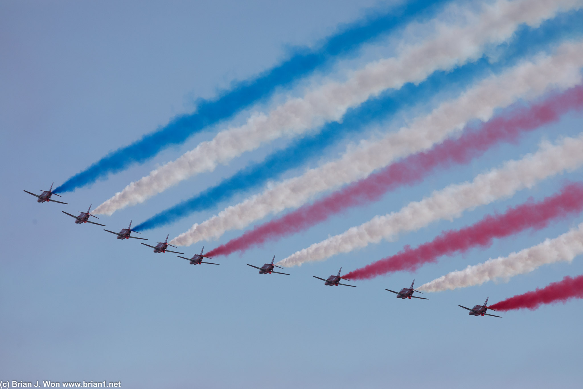 Smoke trails fill the sky.
