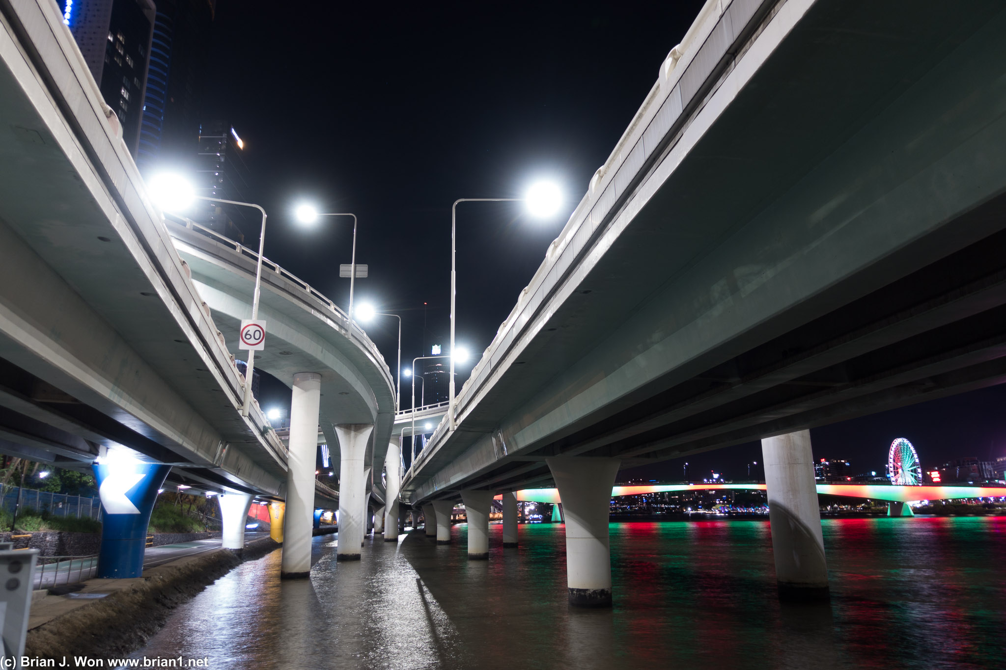 A city of freeways and roads sunk into the waters' edge.