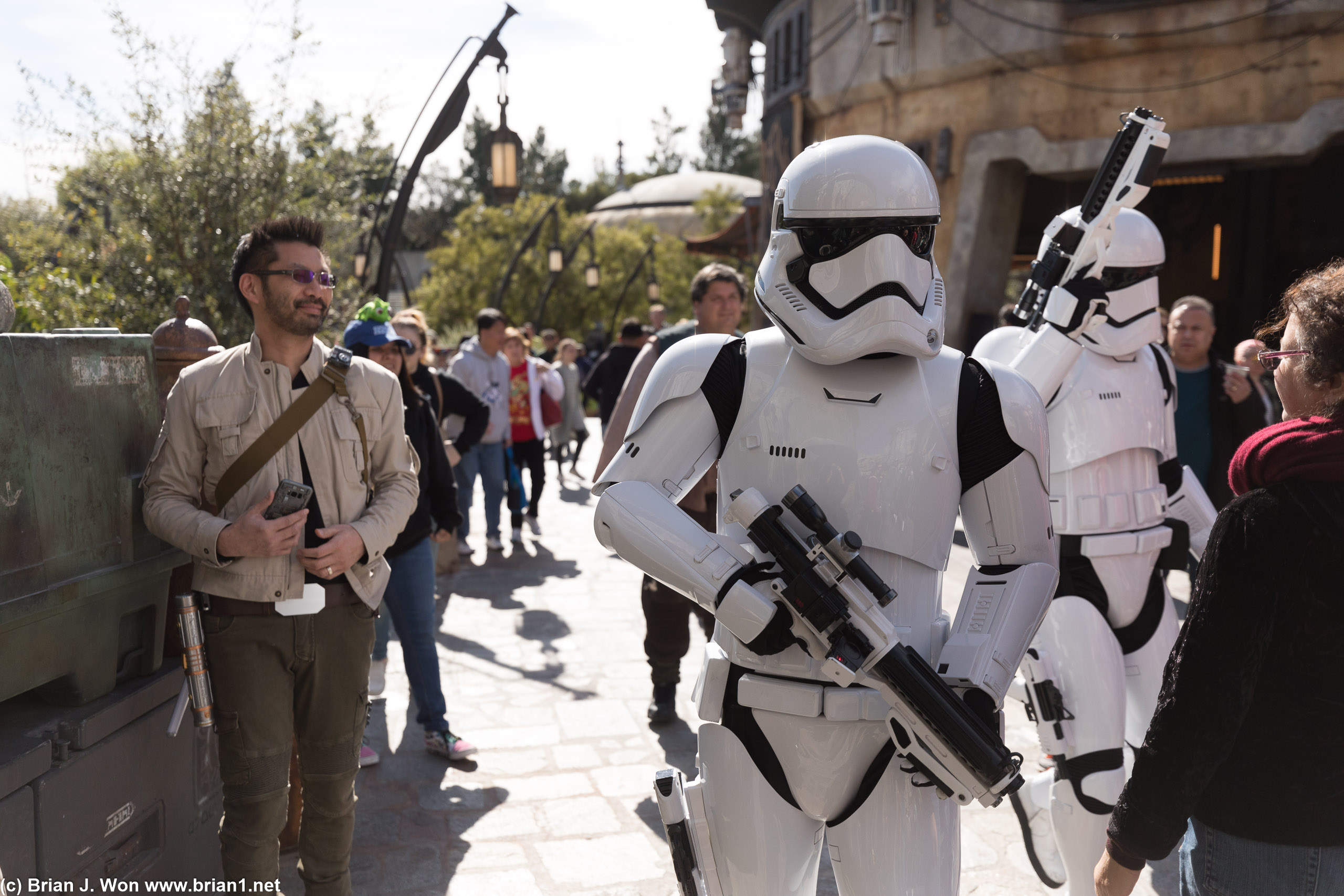 First Order Stormtroopers going through the crowd.