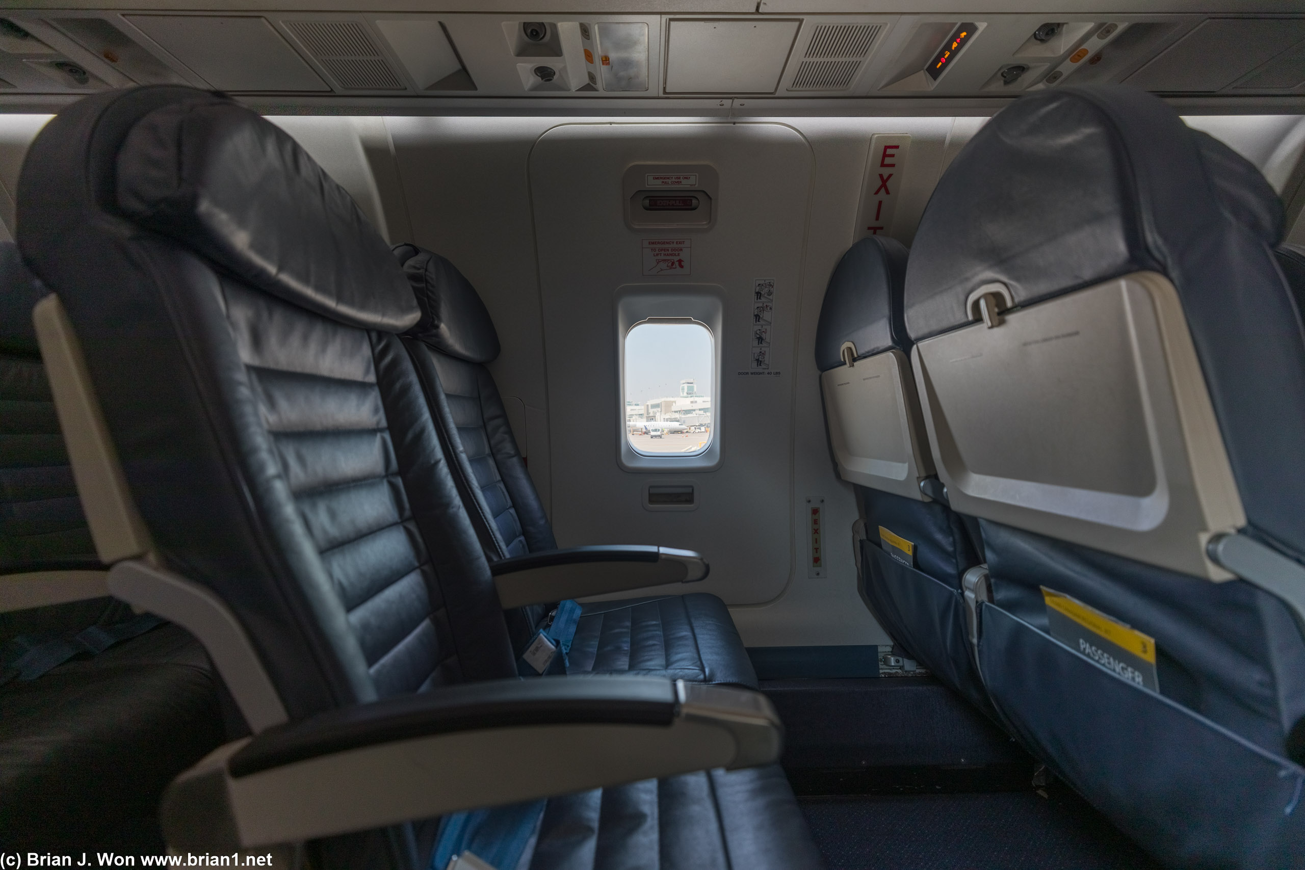 Tiny windows to go with the small overhead bins.