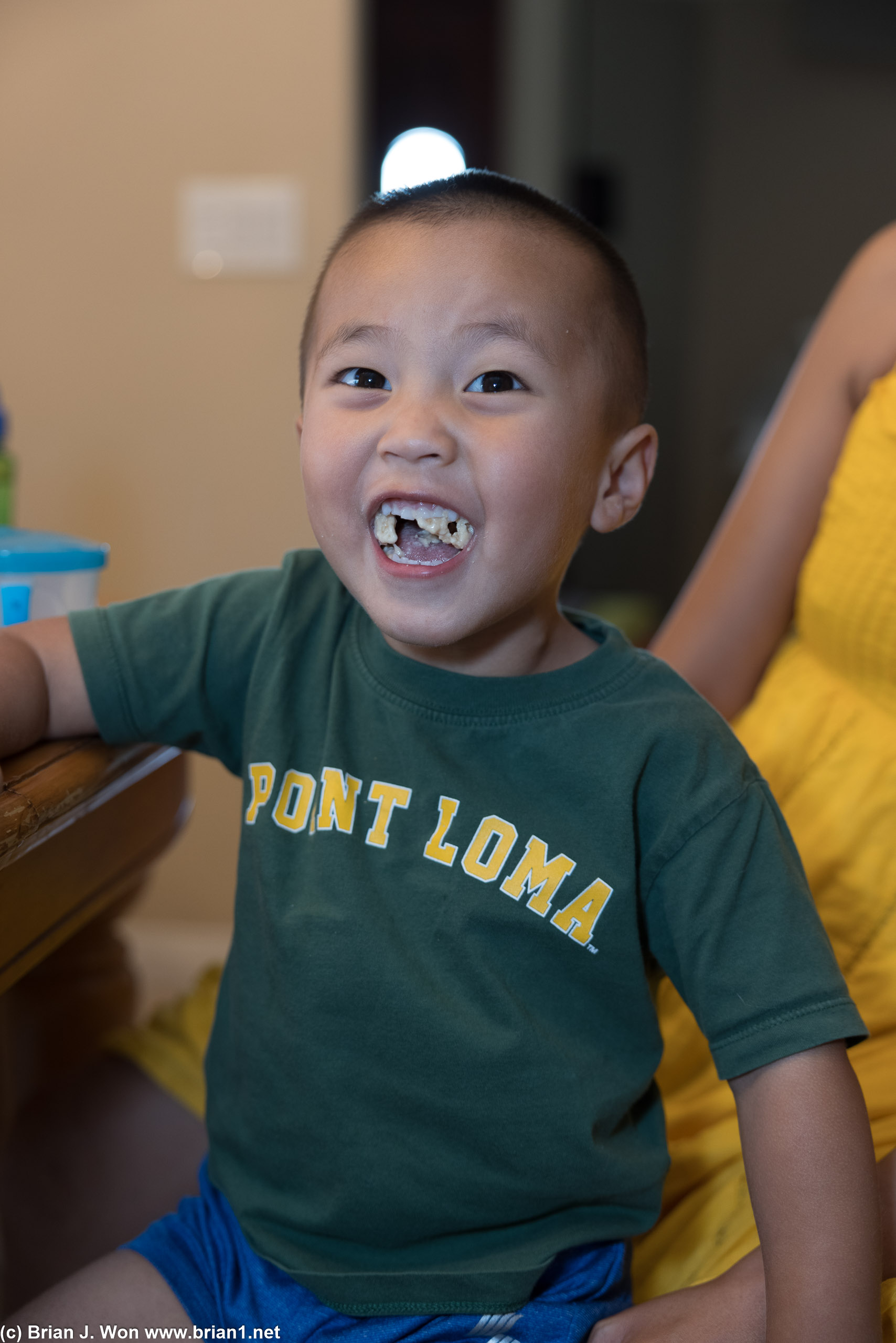 Lucas is still working on finishing chewing his food.