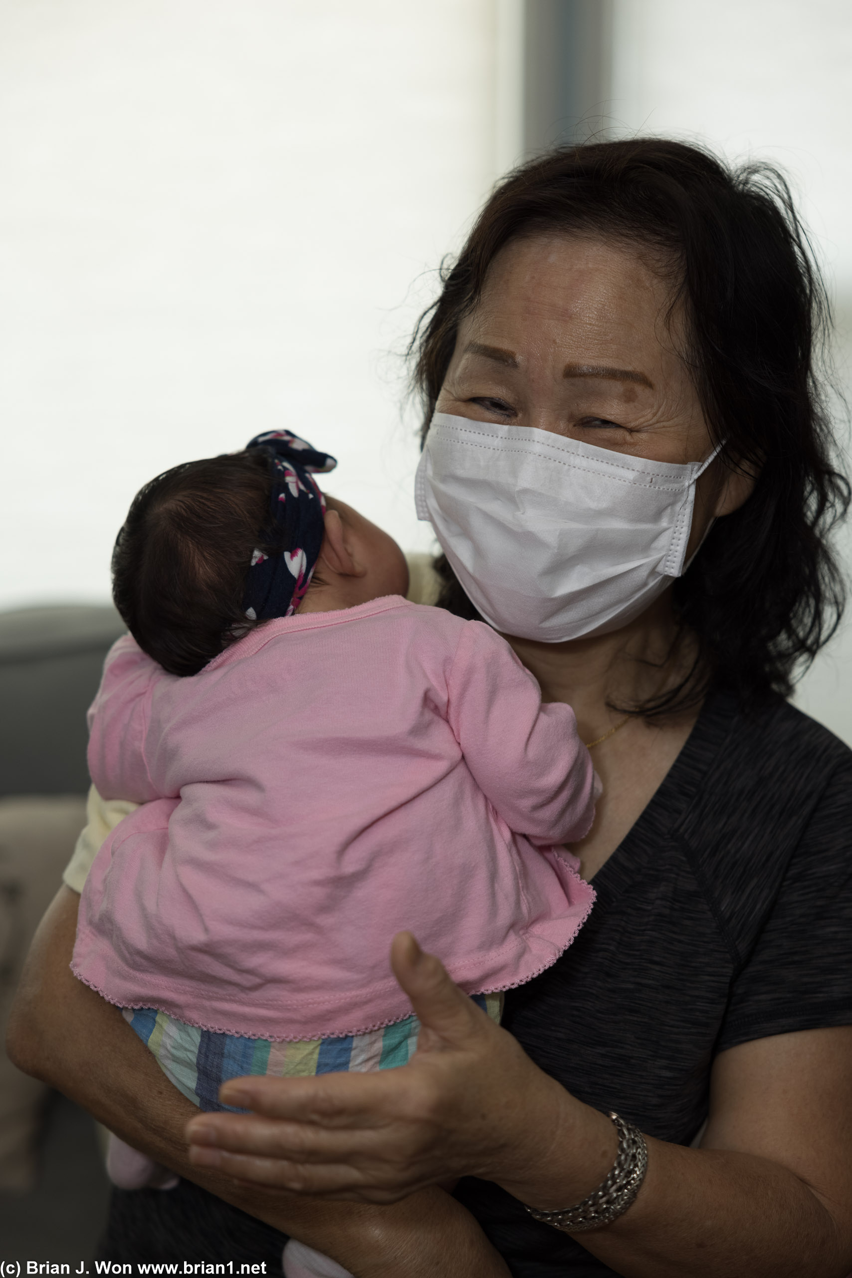 Grandmother with granddaughter.