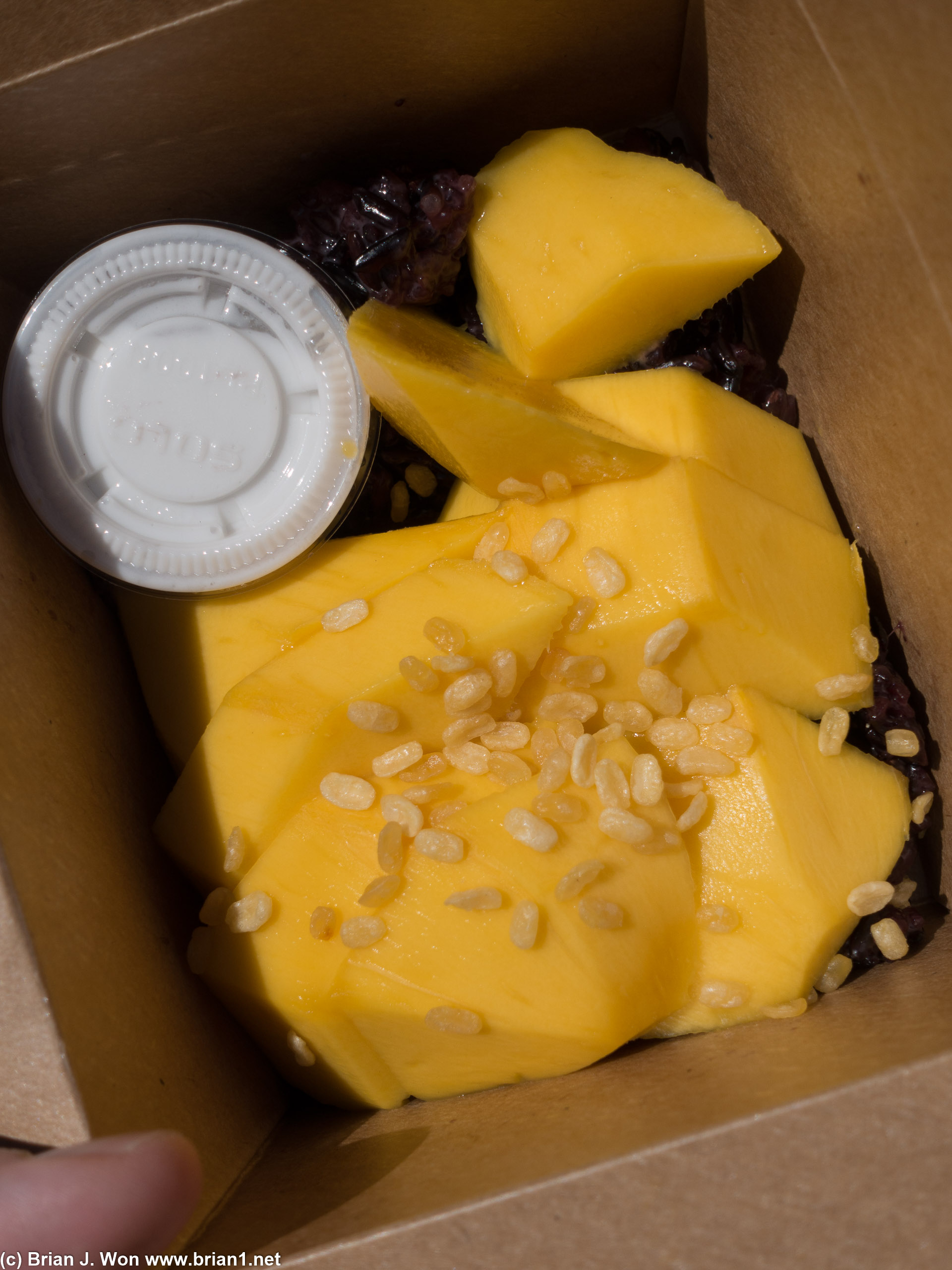 Purple sticky rice underneath. Mangos were pretty ripe, just a touch sour.
