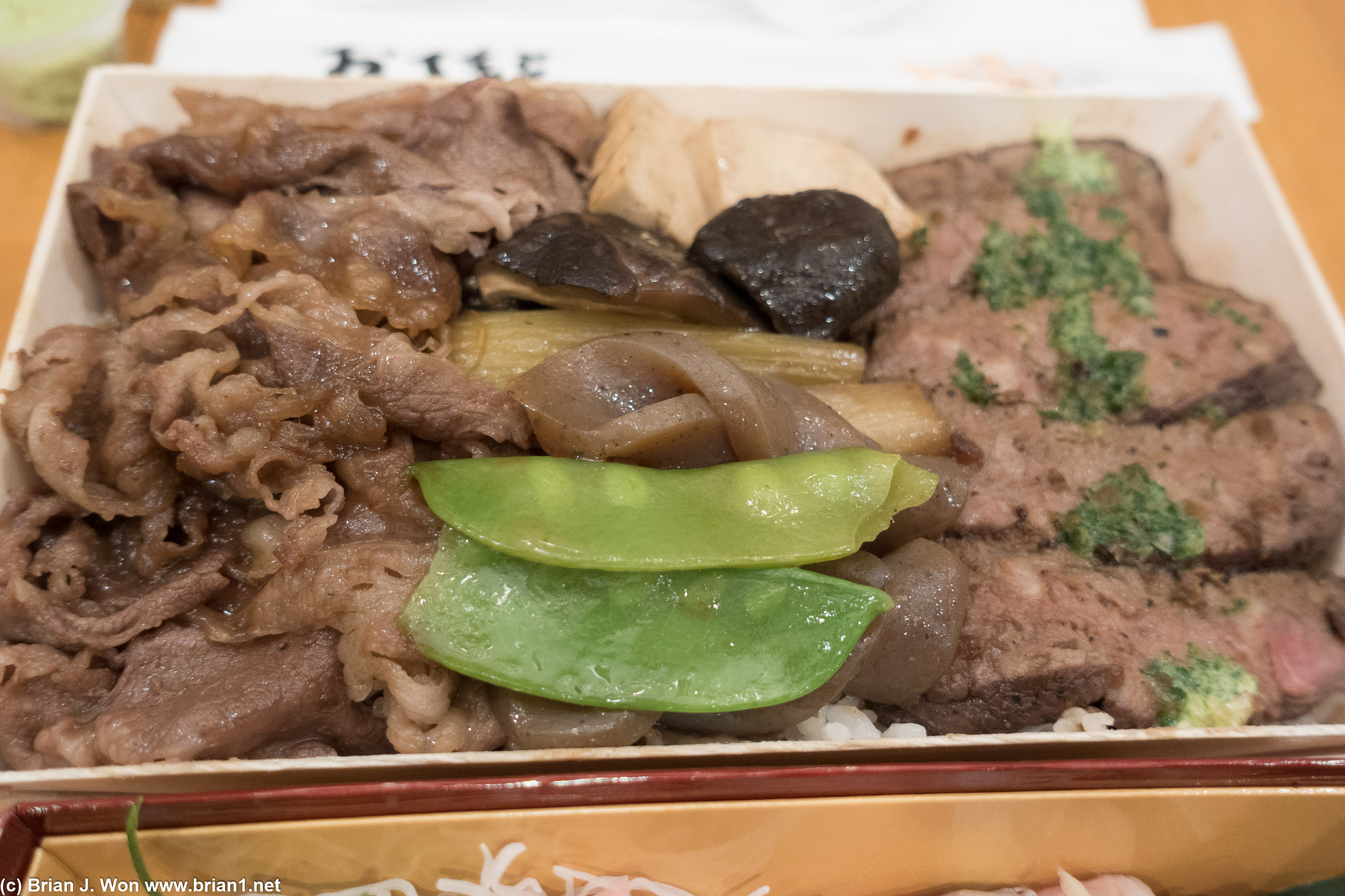 Beef box close-up. Also mushroom, snap peas, tofu.