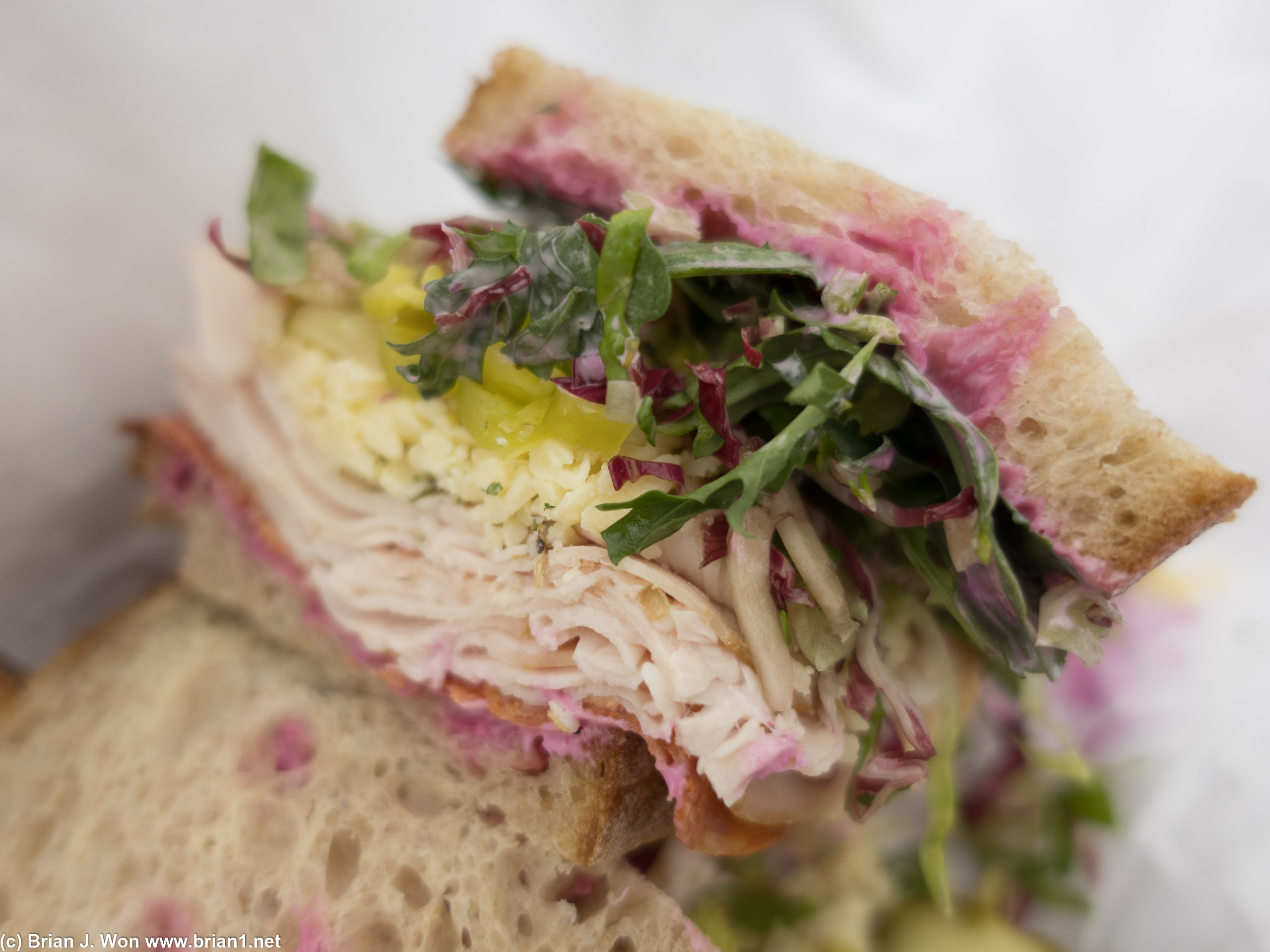 Submarina: "Hobb's Turkey, Uplands Pleasant Ridge Reserve Cheese, Kenter Wild Arugula, Shredded Gems and Radicchio, Kaylin and Hobbs Kosher Pickles, Pepperoncinis, Schaner Red Onion, County Line Bull's Blood Beet Mayo and Mama Ro's Dried Oregano on Bub and Grandma's Bread. Add Hobb's Pepperoni if you're feeling fierce."
