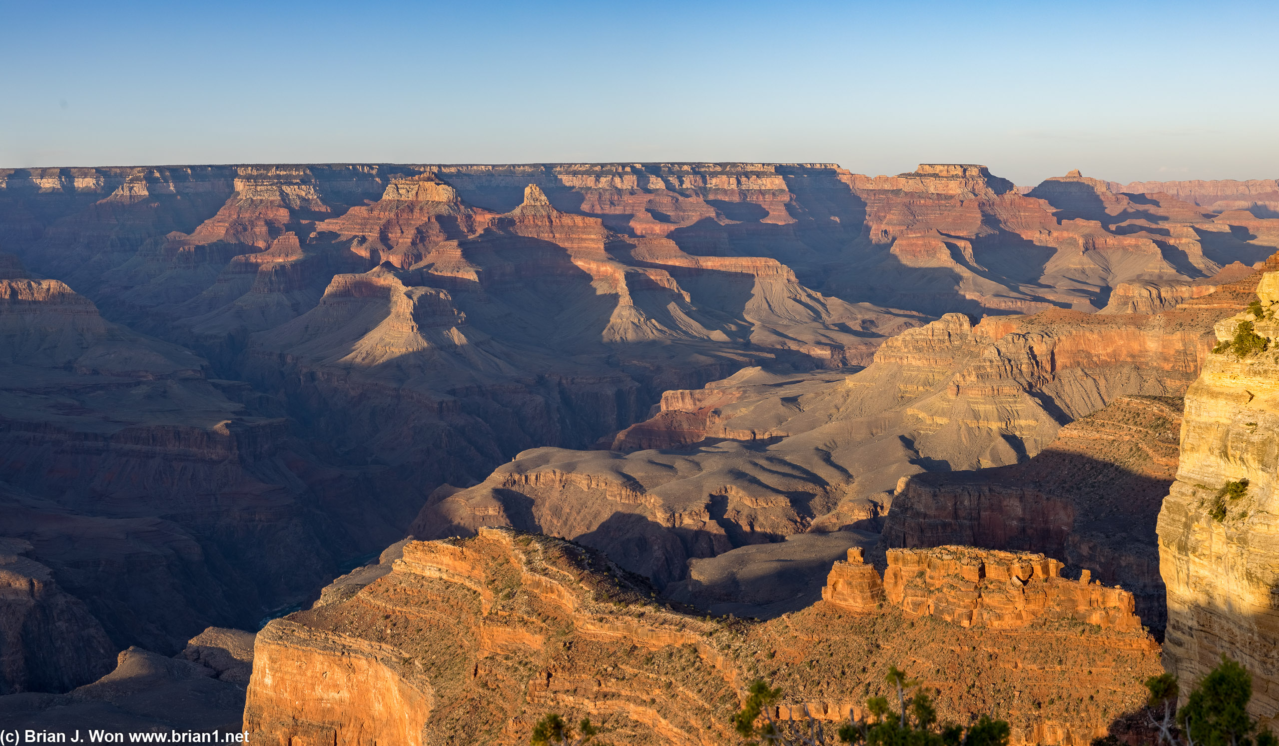 Sunset illuminates the canyon, looking east from Hopi Point.