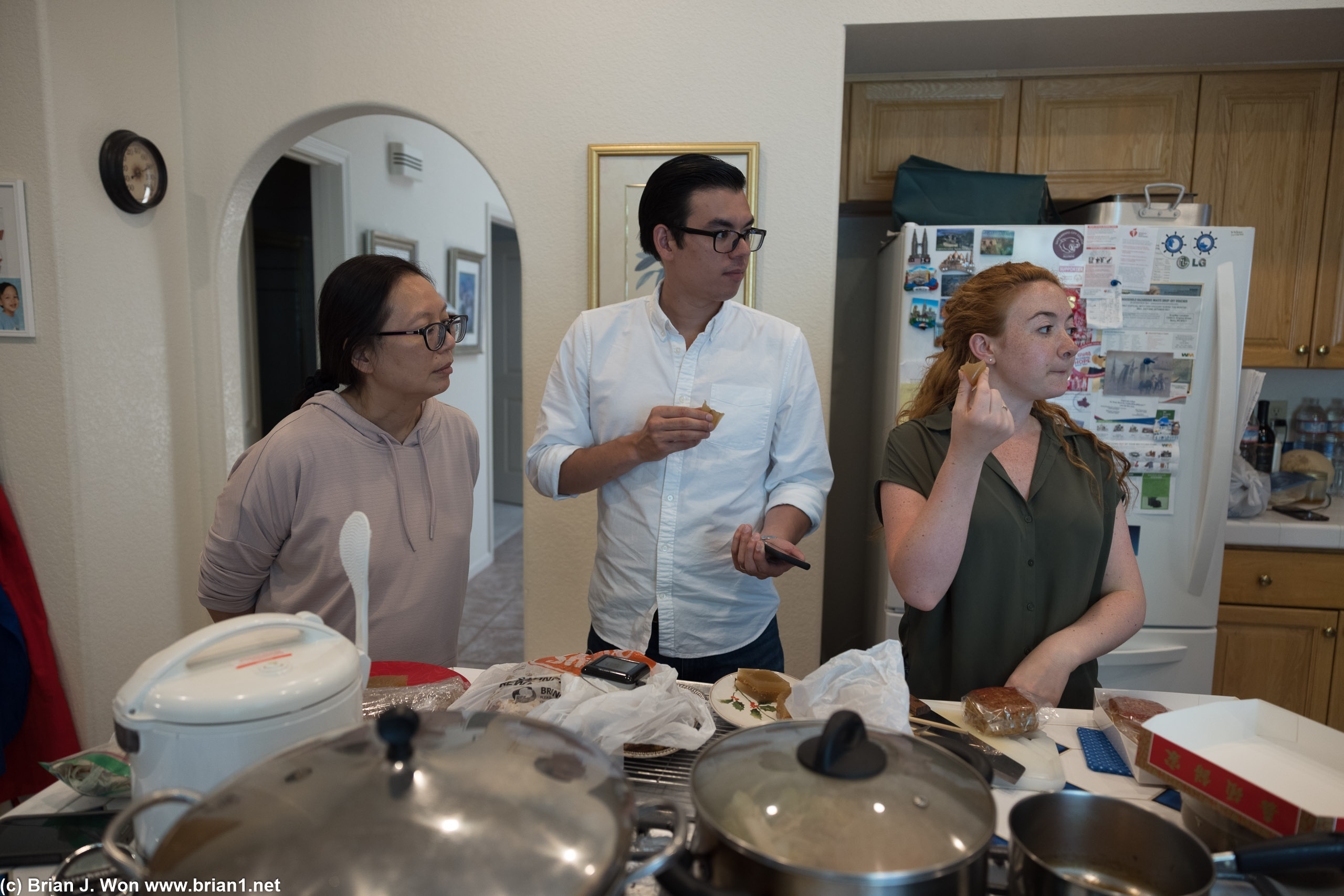Gathered in the kitchen.