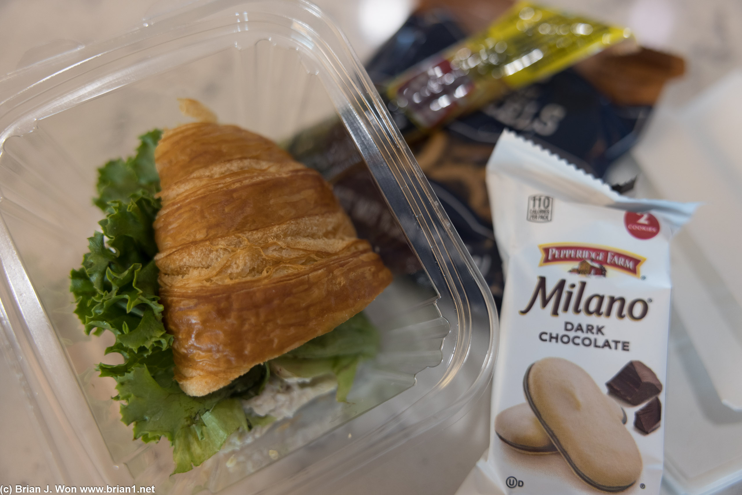 Chicken sandwich, milano cookies, beef stick, pretzels.