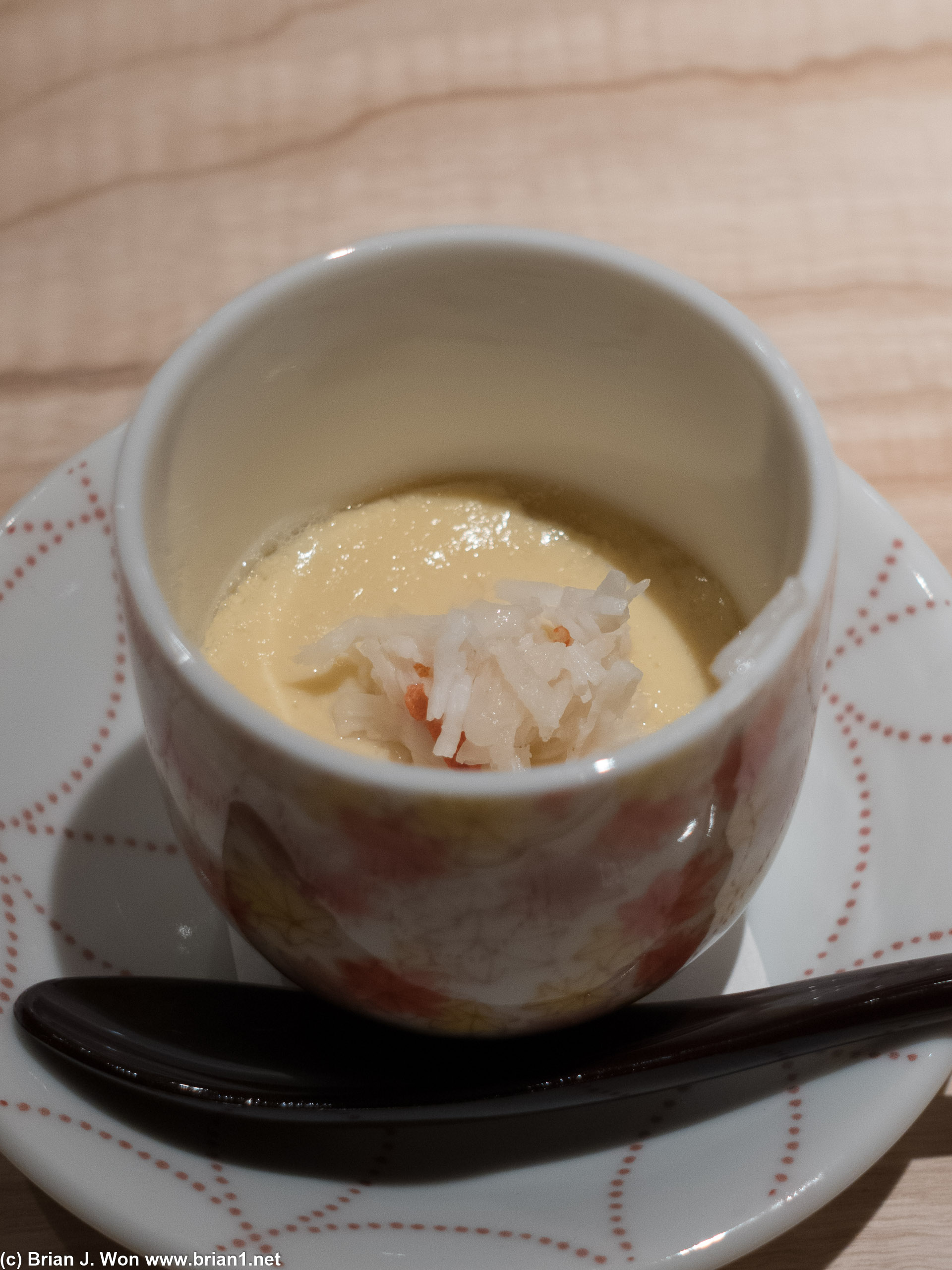 King crab atop a base of winter melon puree, shitake mushroom, and egg.