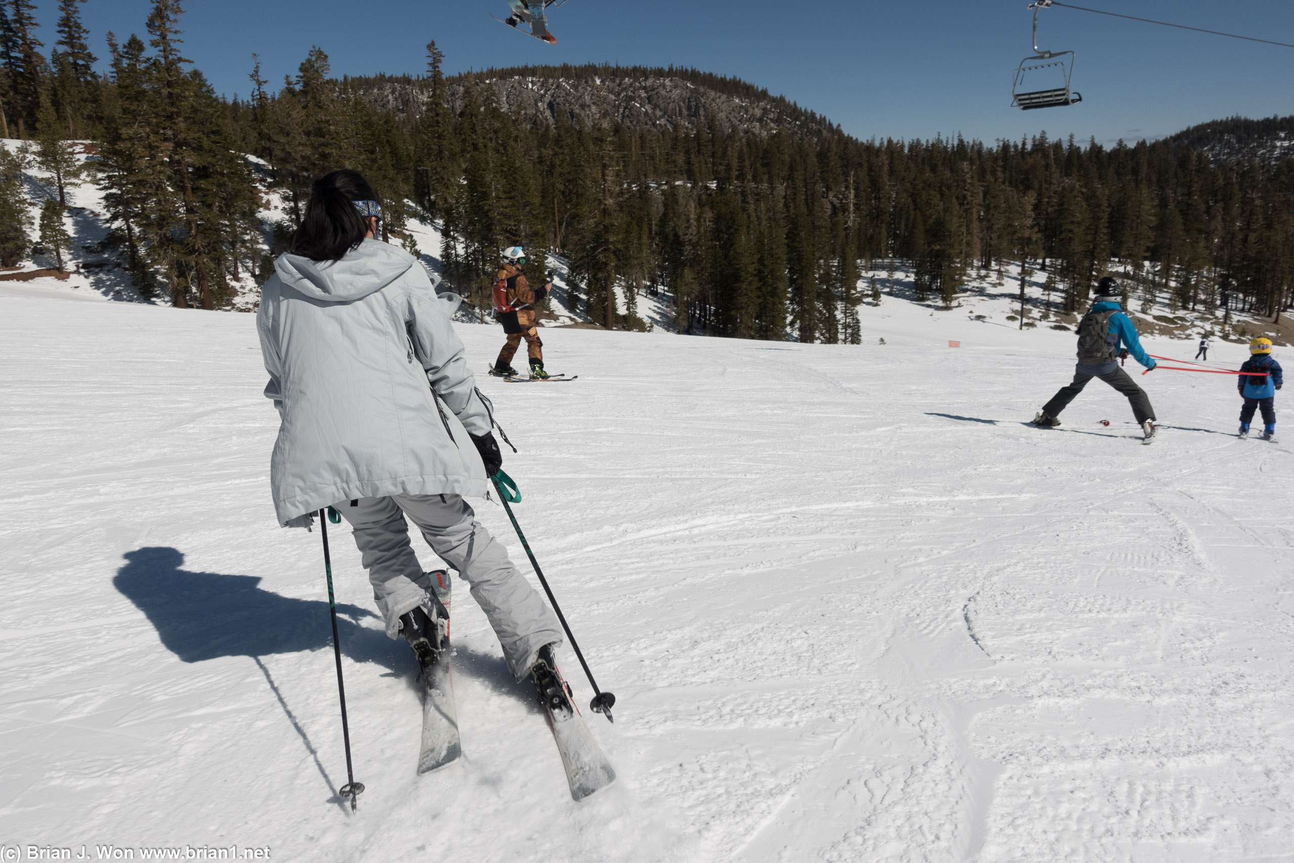 Pearl and Chris follow Lucas down the slopes.
