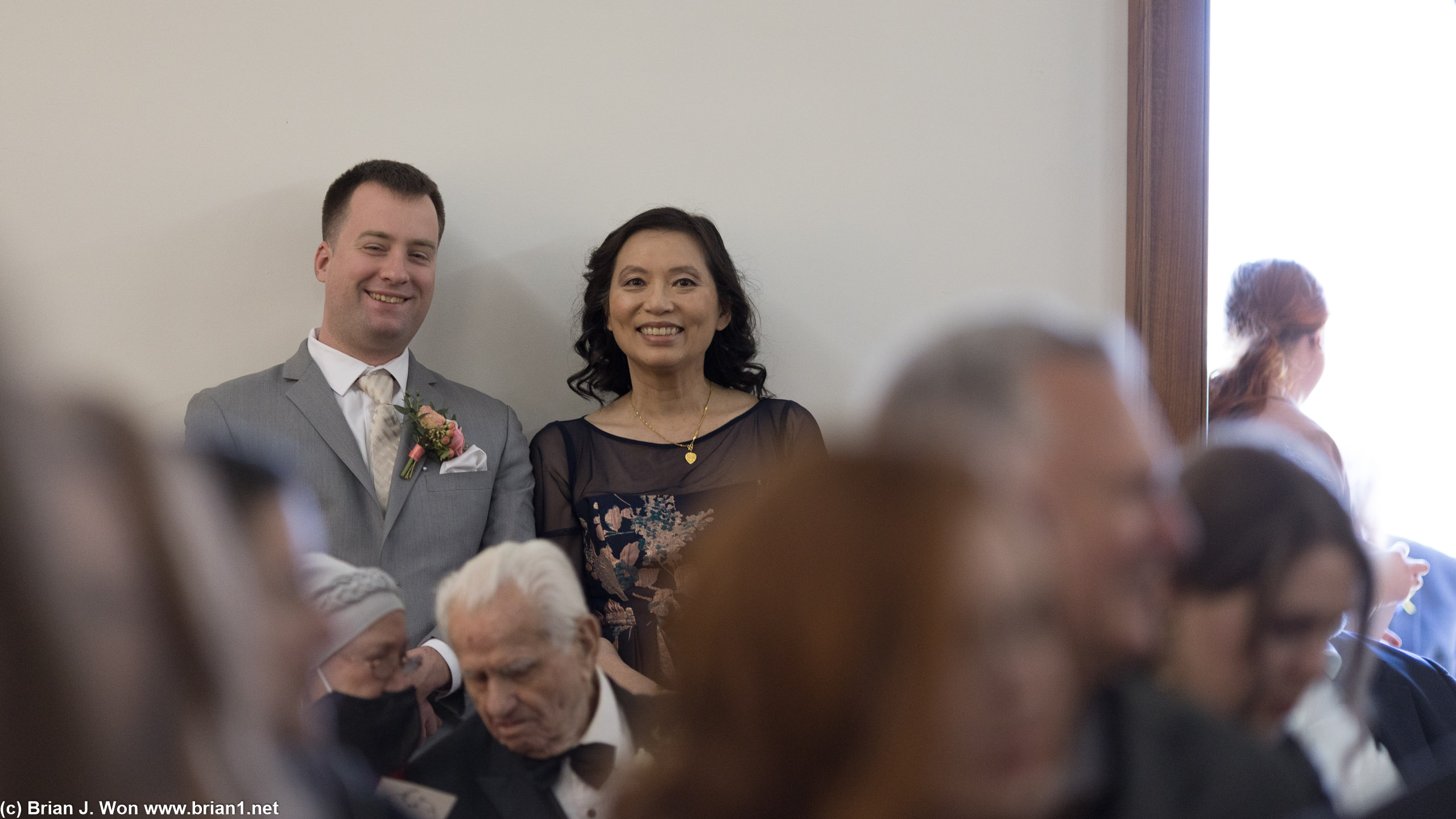 Mother of the groom waiting with the best man.