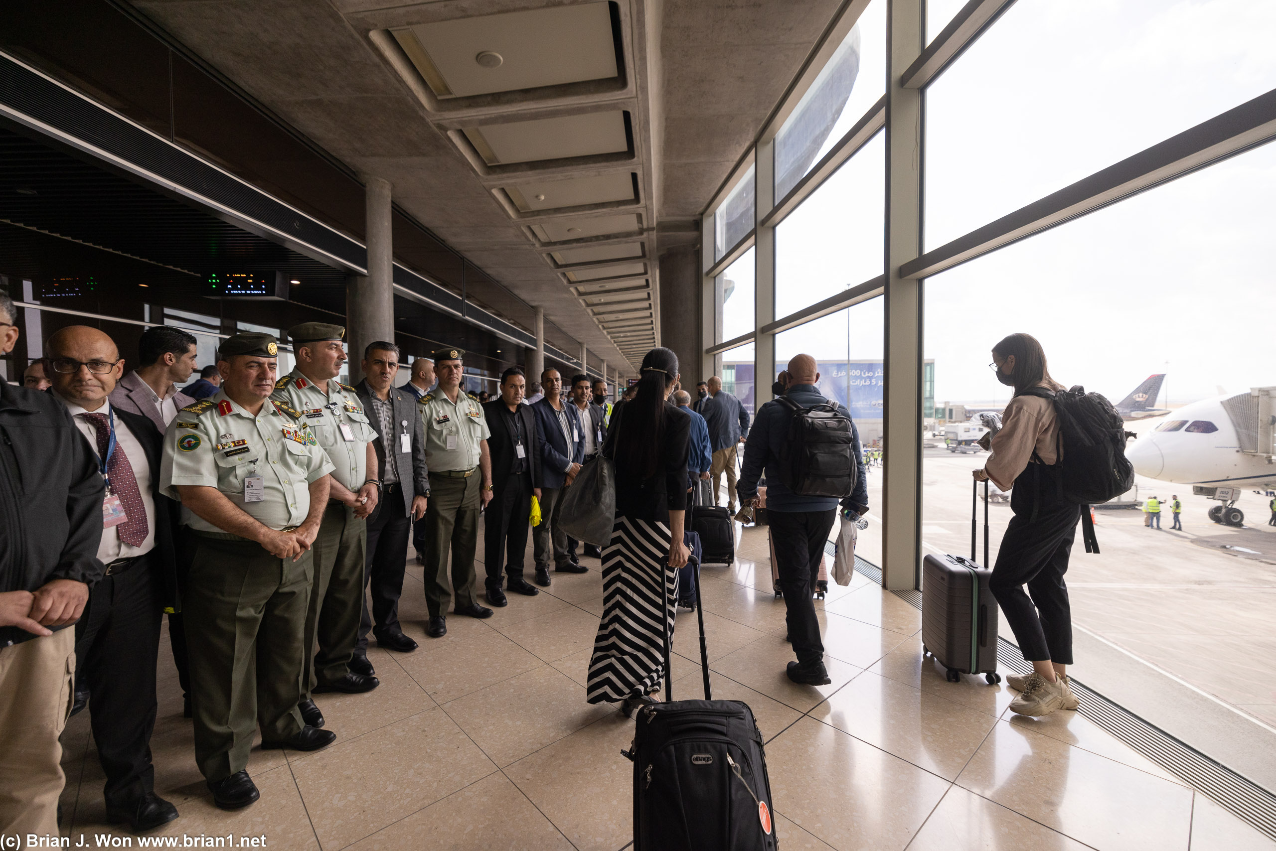 Lots of suits and uniforms greeted the inaugural flight.